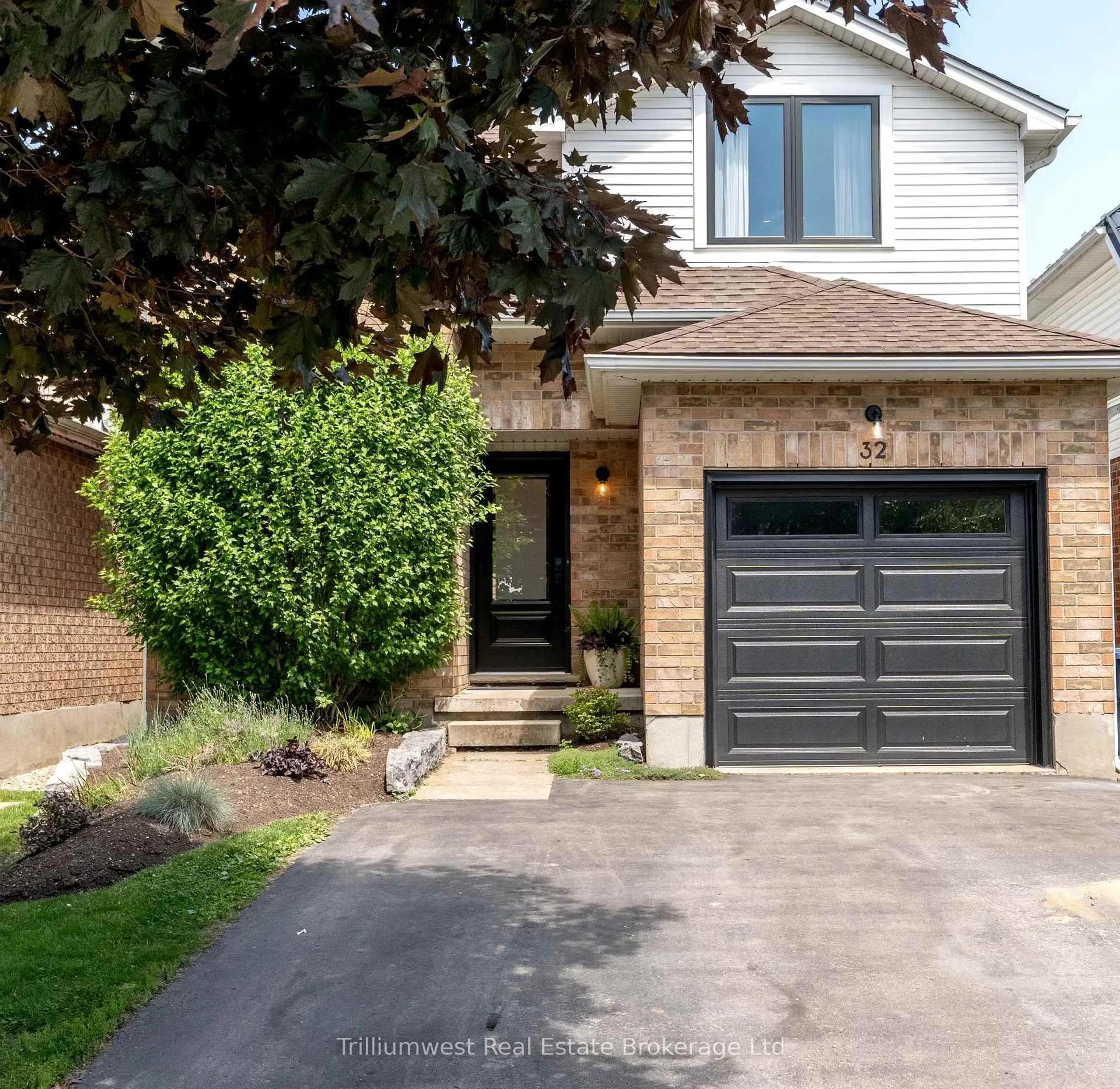 Home with brick exterior material, street for 32 Waxwing Cres, Guelph Ontario N1C 1E1