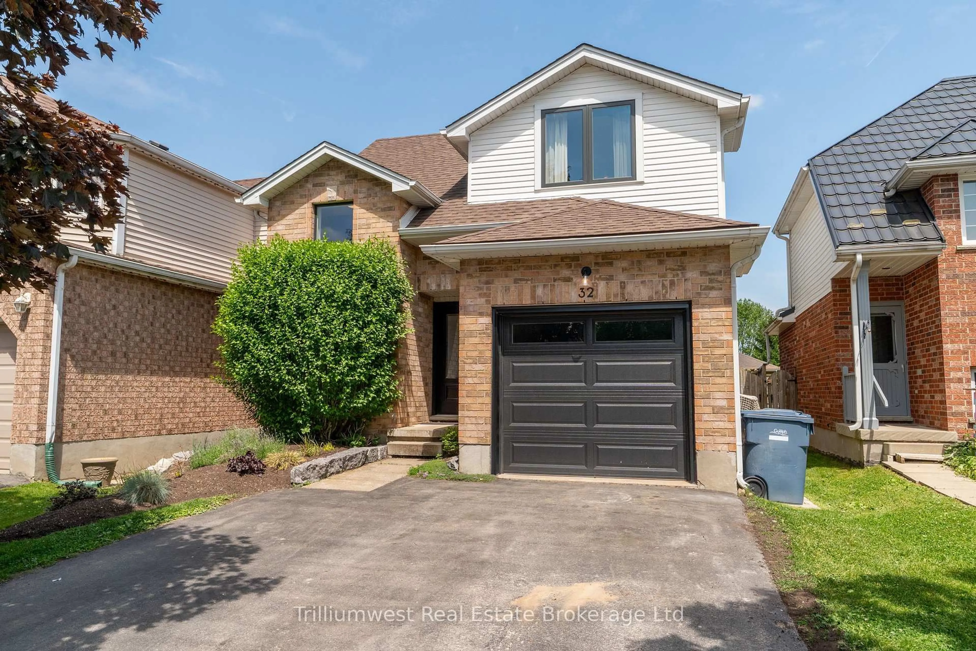 Home with brick exterior material, street for 32 Waxwing Cres, Guelph Ontario N1C 1E1