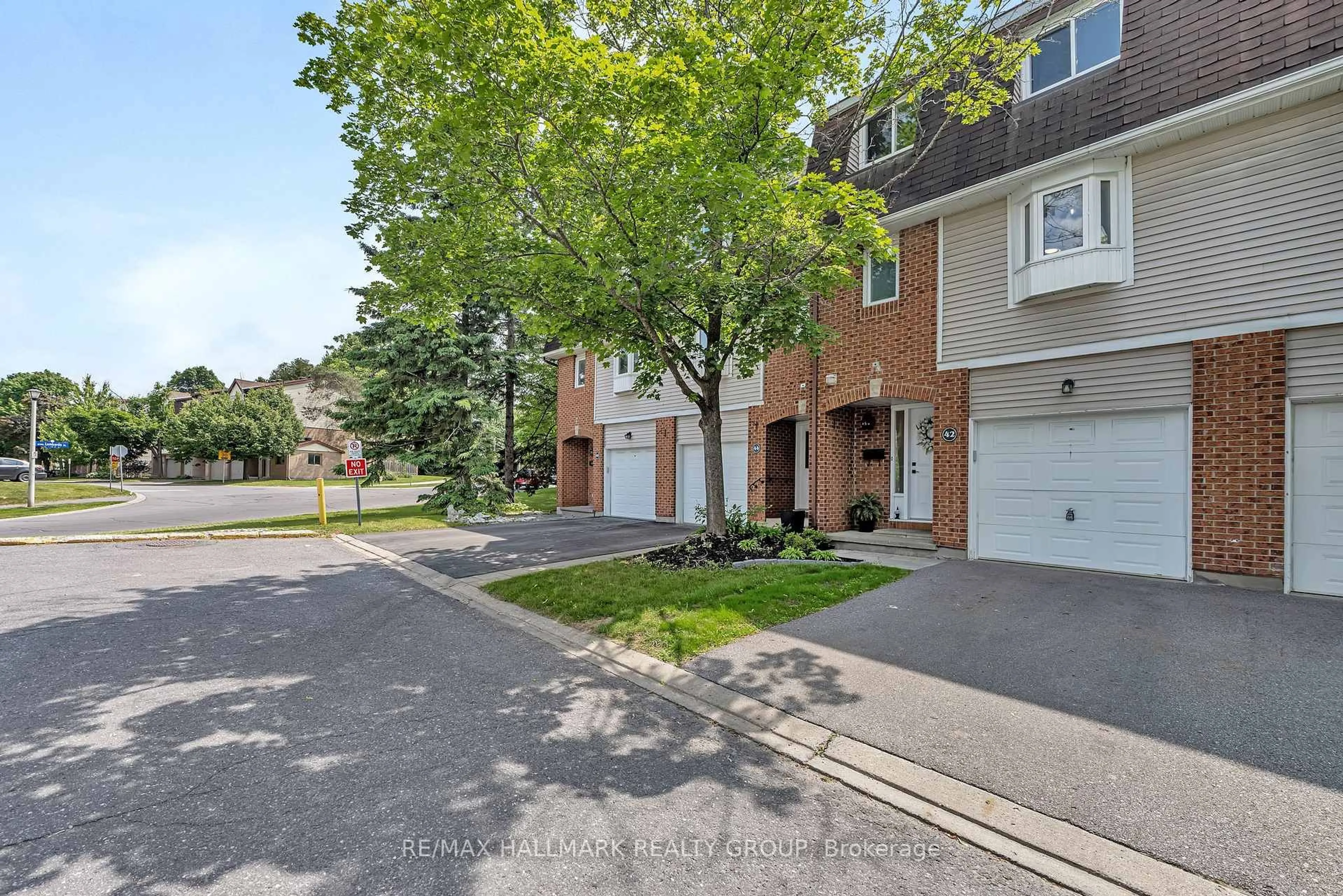 A pic from outside/outdoor area/front of a property/back of a property/a pic from drone, street for 42 Almond Lane #n/a, Ottawa Ontario K2L 3T4