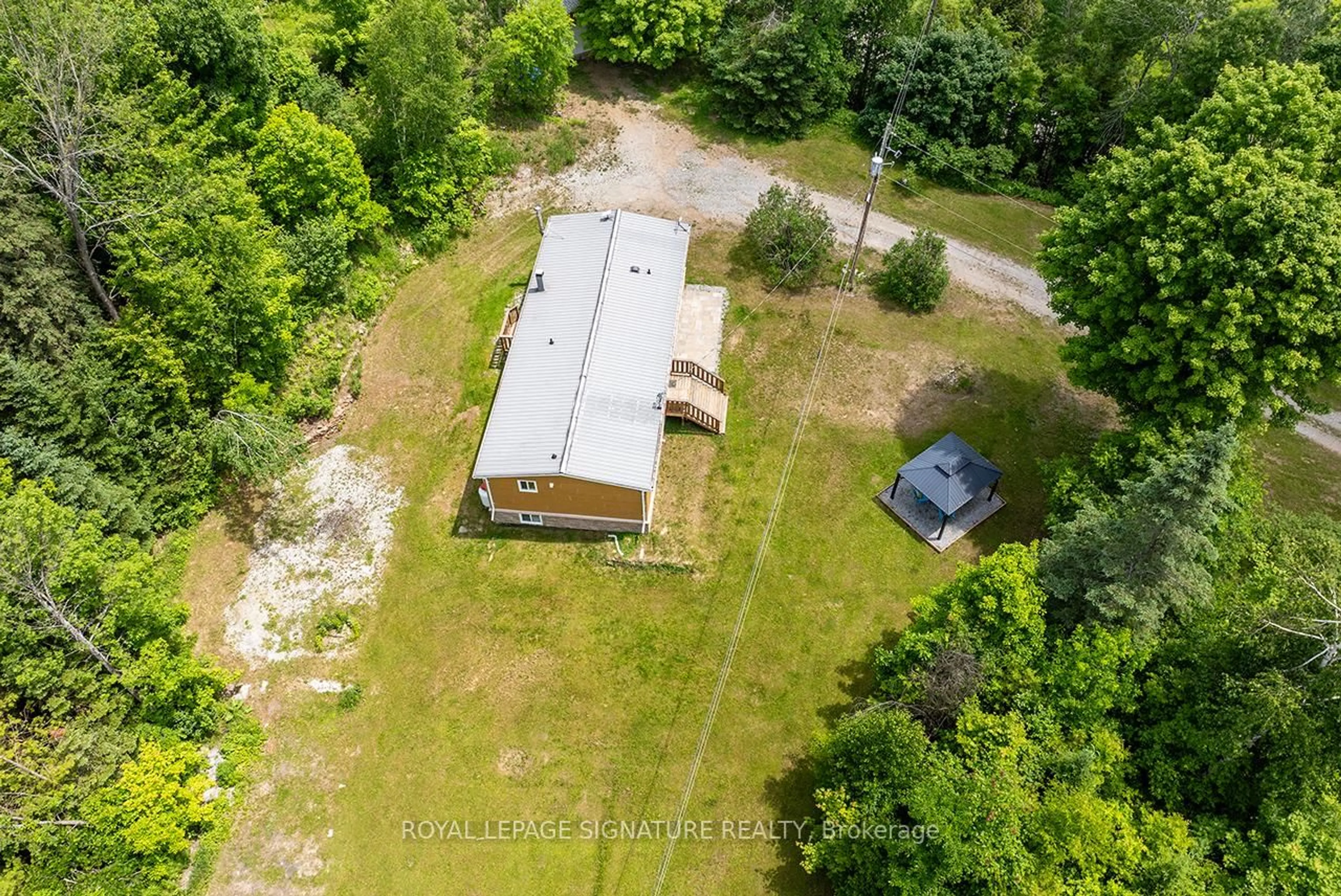 A pic from outside/outdoor area/front of a property/back of a property/a pic from drone, building for 147 Buller Rd, Kawartha Lakes Ontario K0M 2L0