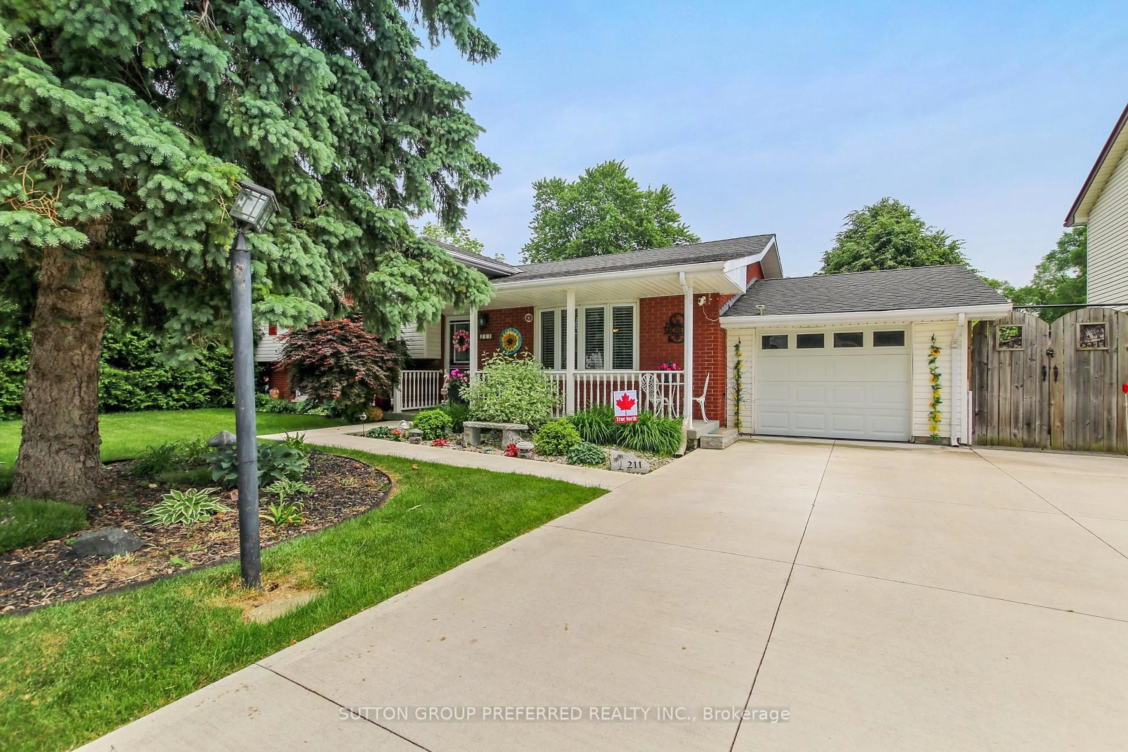Home with vinyl exterior material, street for 211 Union St, Central Elgin Ontario N0L 1B0