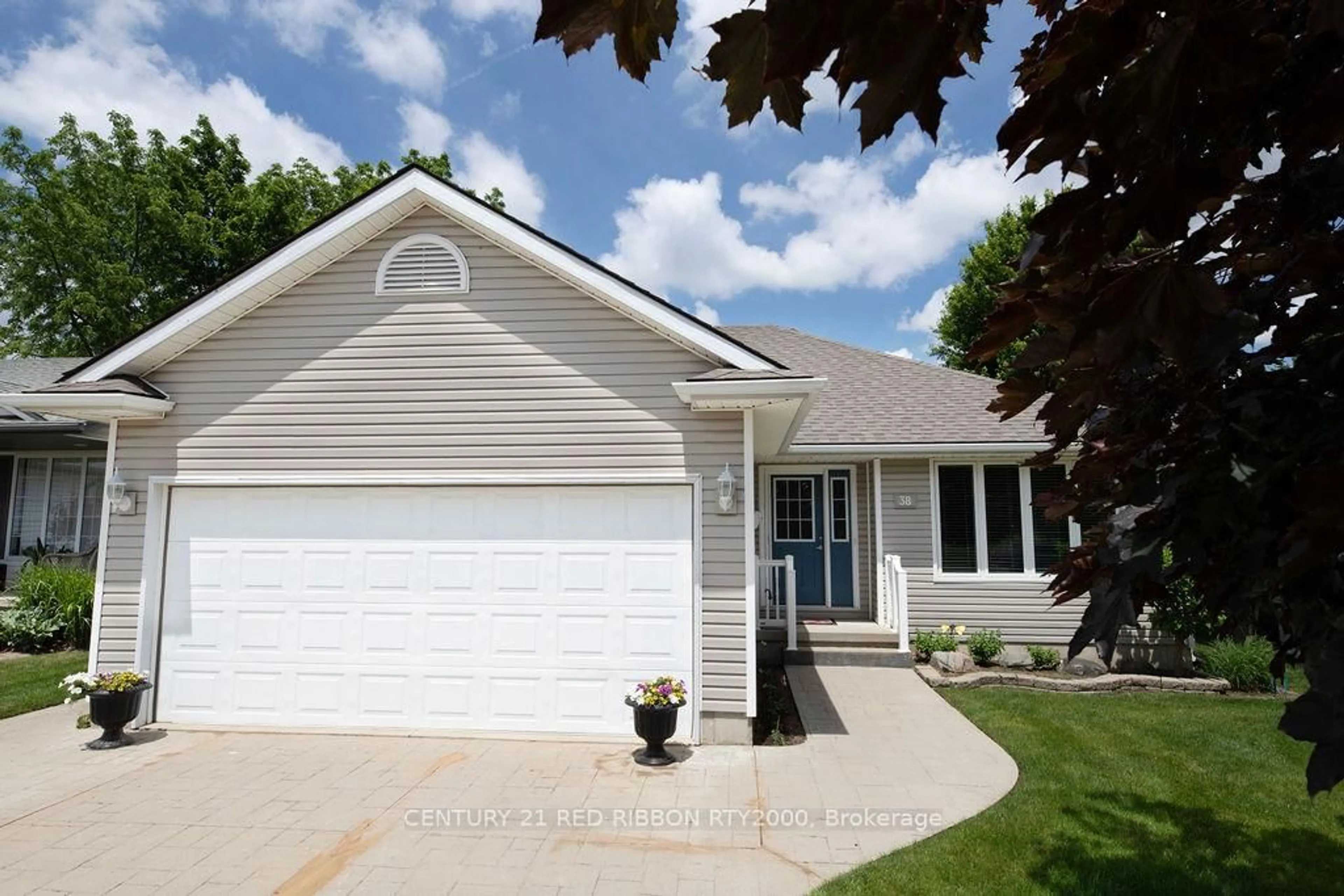 Home with vinyl exterior material, street for 38 Bella St, Strathroy-Caradoc Ontario N7G 1C4