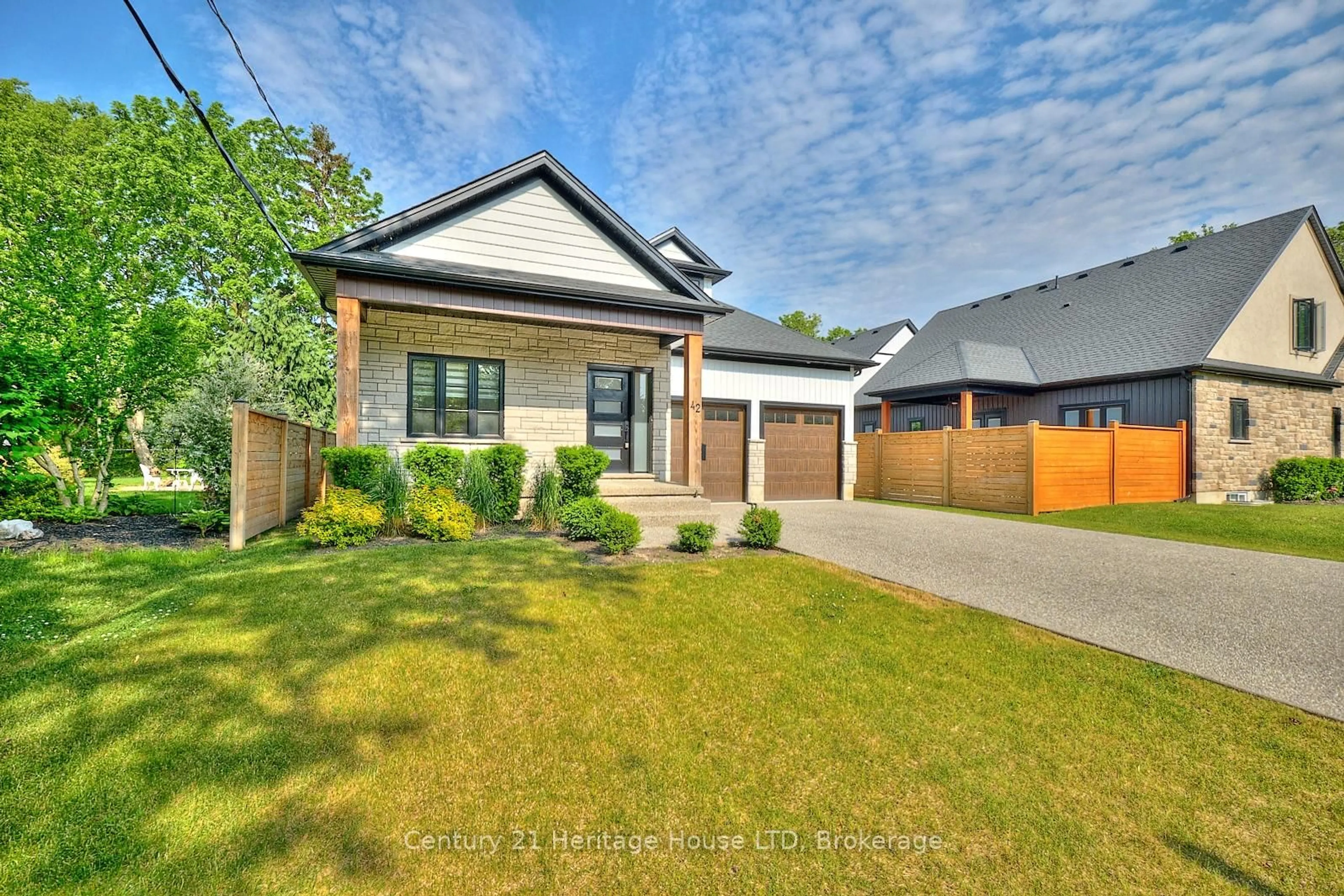 Home with brick exterior material, street for 42 Aquadale Dr, St. Catharines Ontario L2N 2P8
