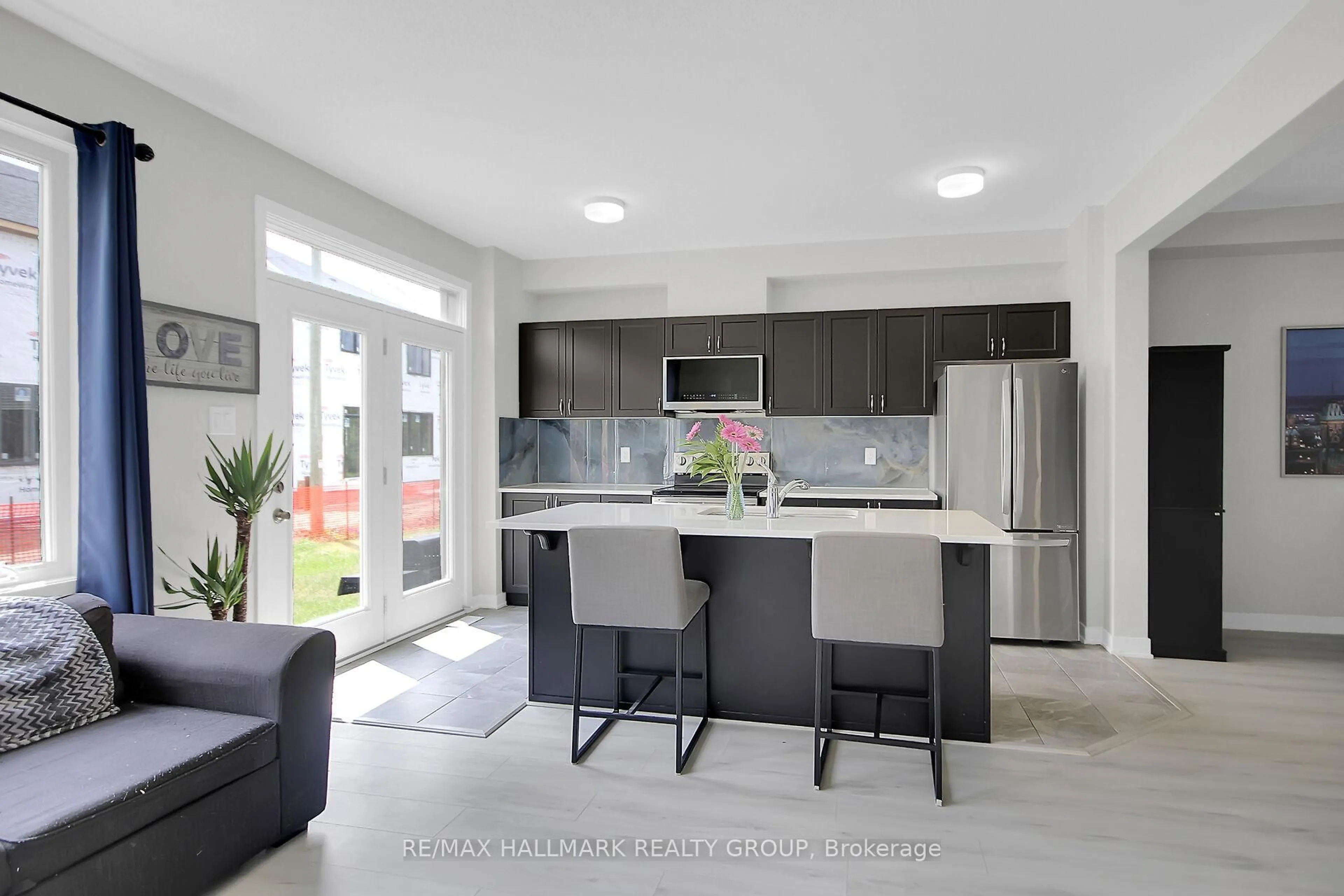 Open concept kitchen, ceramic/tile floor for 676 Quilter Row, Richmond Ontario K0A 2Z0