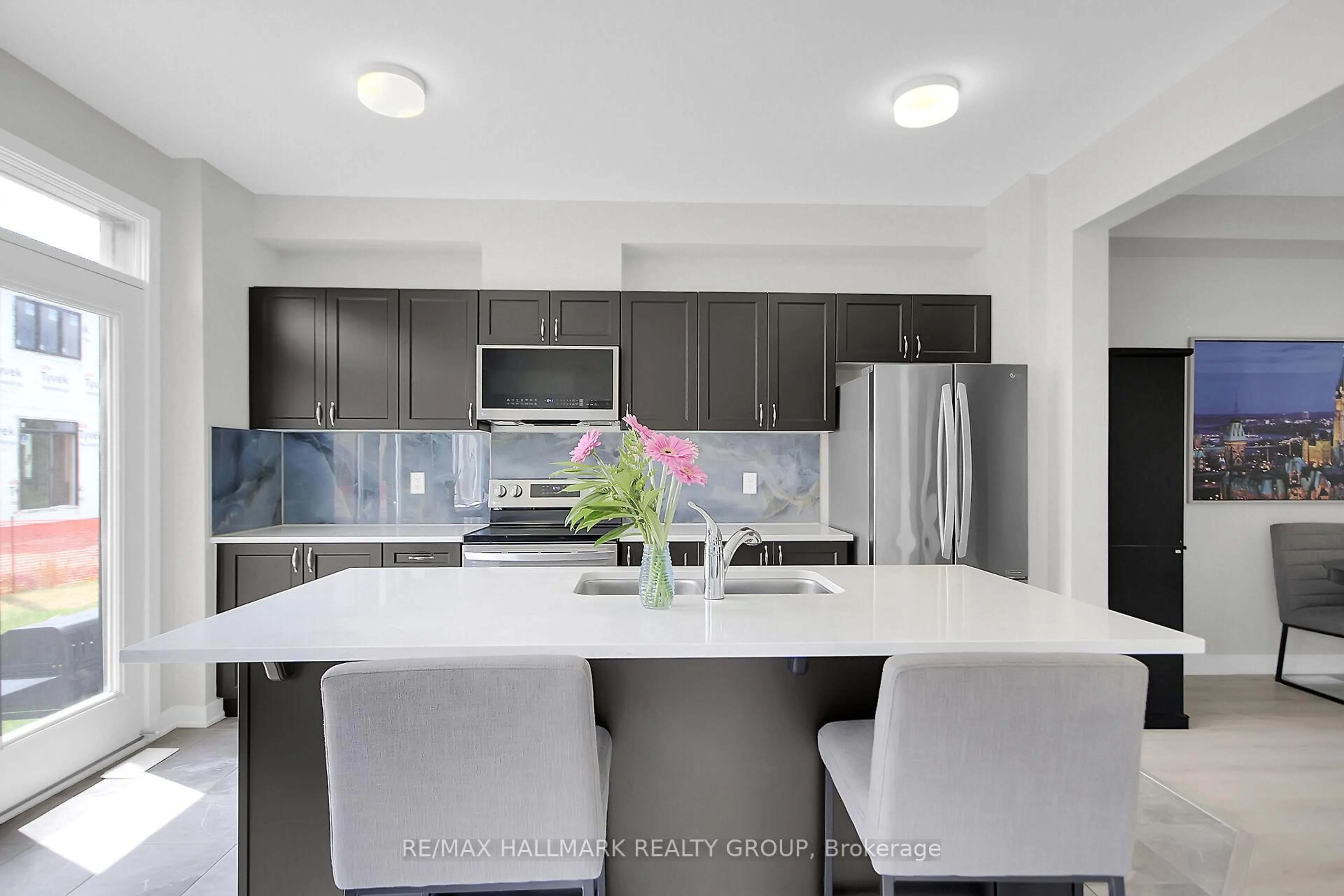 Open concept kitchen, ceramic/tile floor for 676 Quilter Row, Richmond Ontario K0A 2Z0