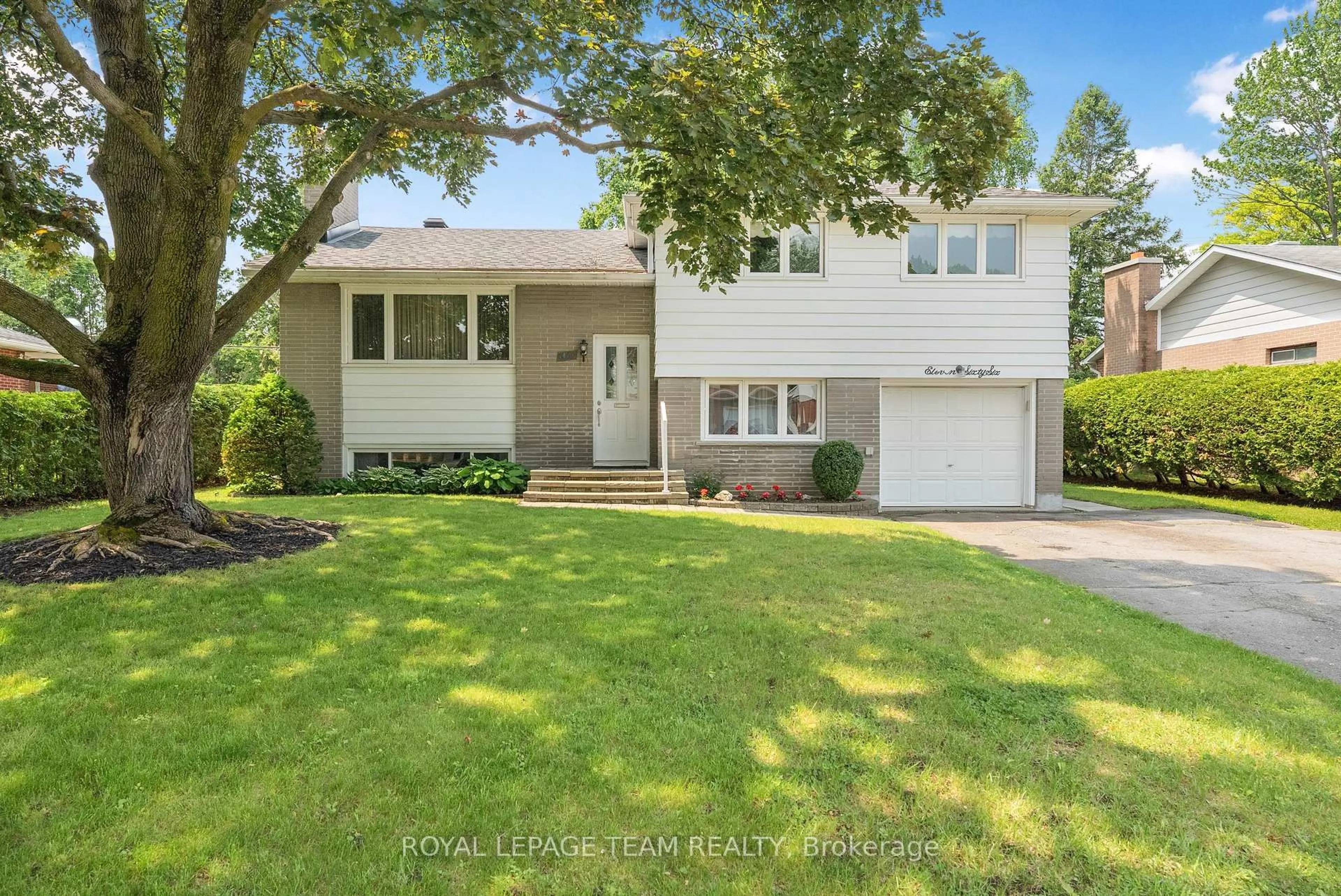 Home with vinyl exterior material, street for 1166 Castle Hill Cres, Ottawa Ontario K2C 2A8