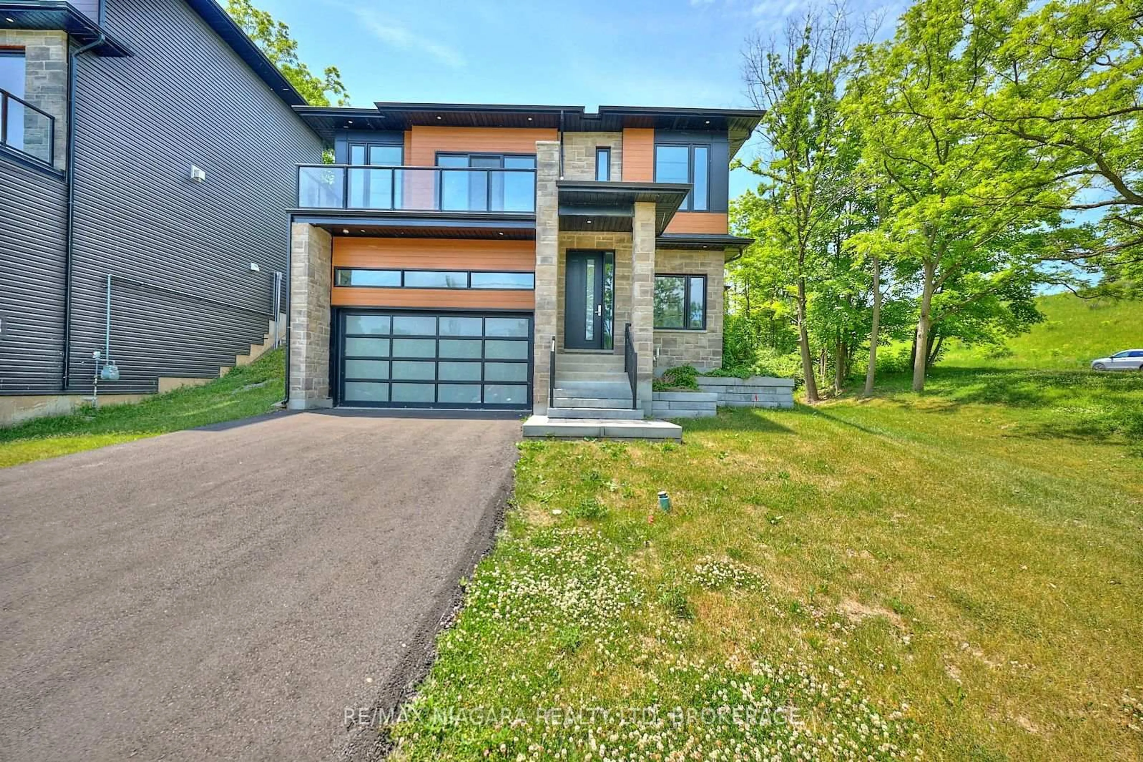 Home with brick exterior material, street for 119 Welland Vale Rd, St. Catharines Ontario L2S 3Y2