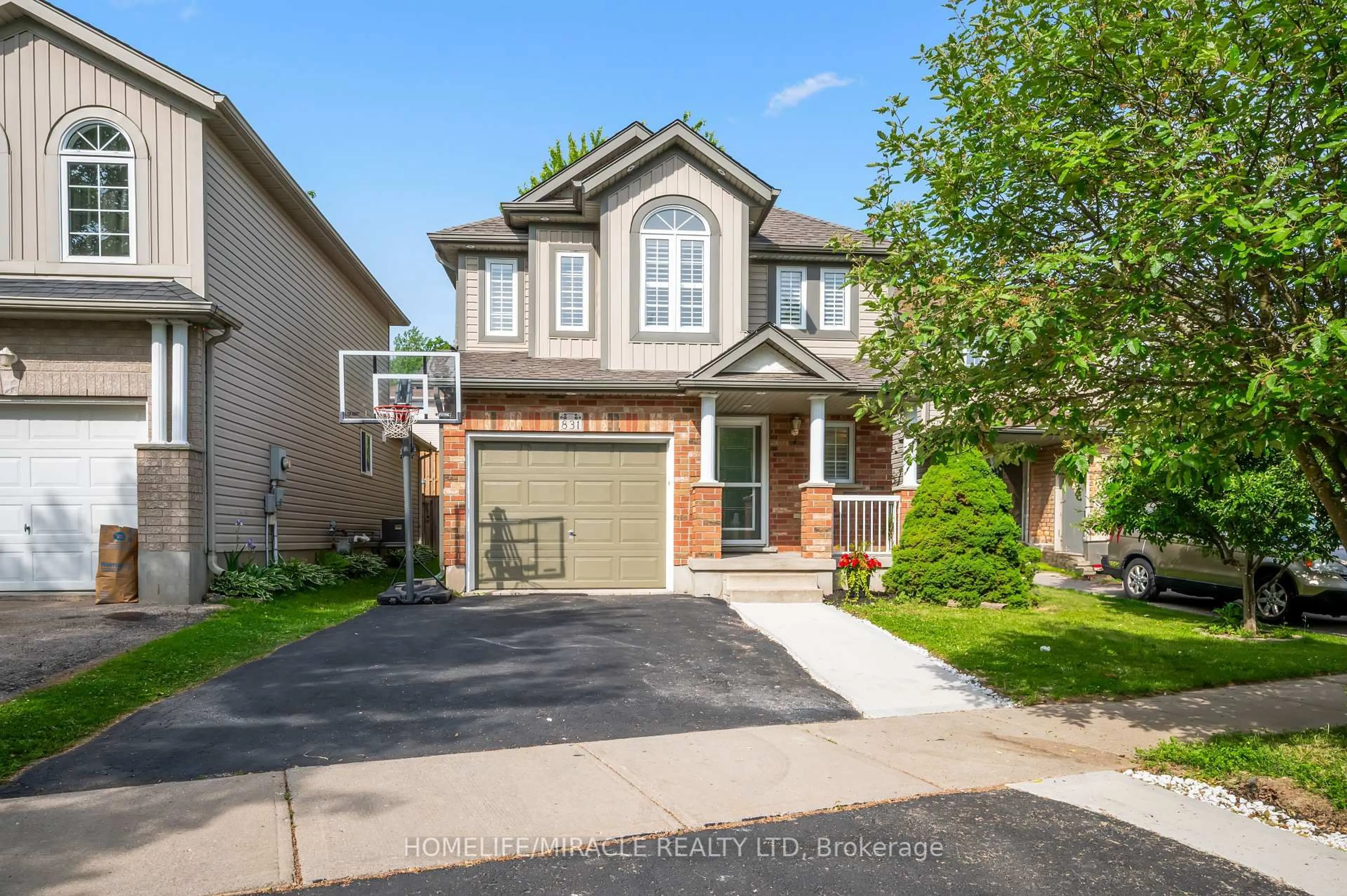 Home with brick exterior material, street for 831 Whitecap Ave, Waterloo Ontario N2K 4L4