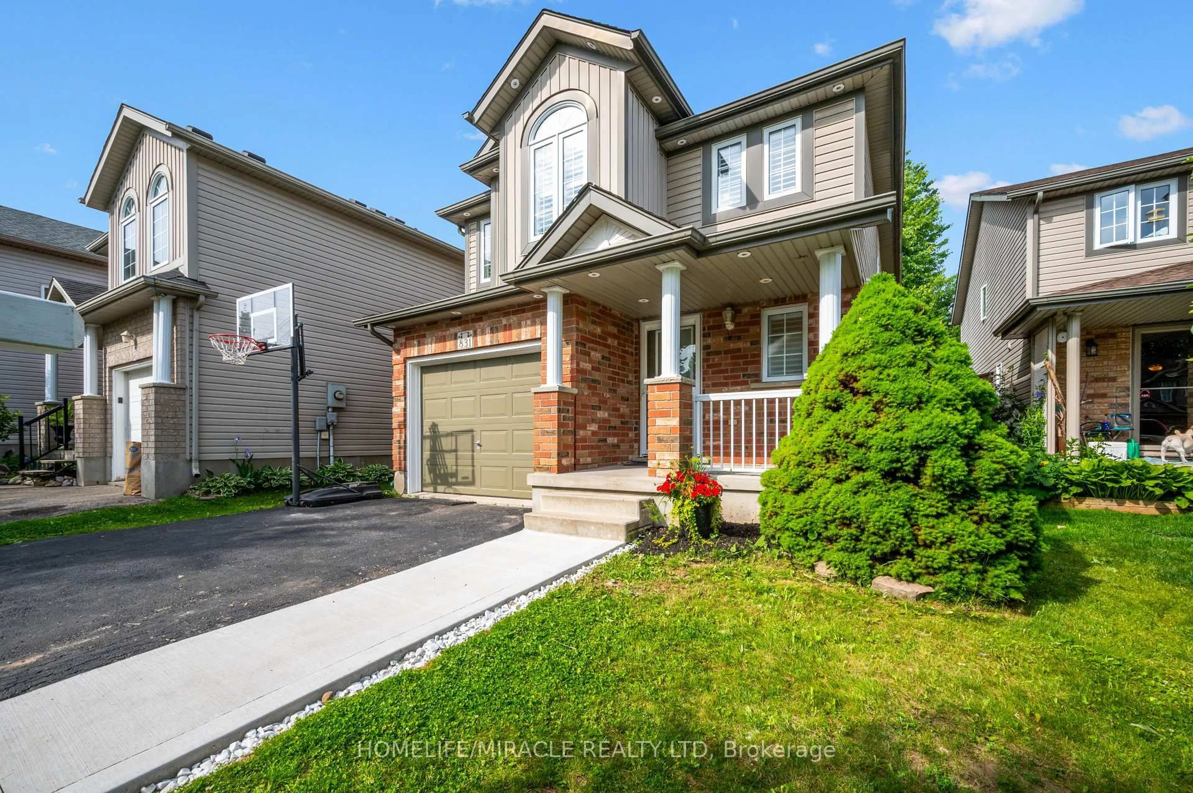 Home with brick exterior material, street for 831 Whitecap Ave, Waterloo Ontario N2K 4L4