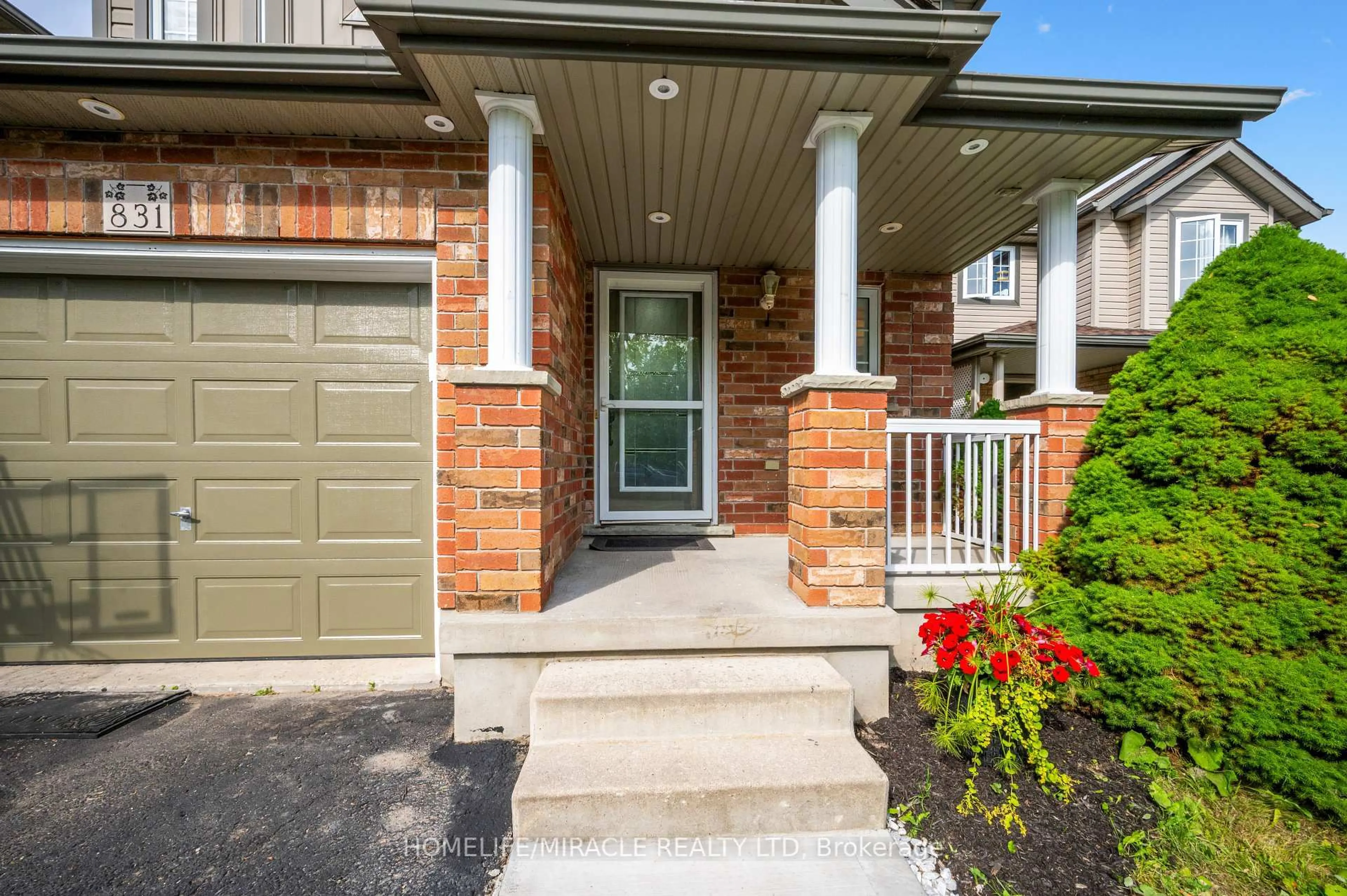 Home with brick exterior material, street for 831 Whitecap Ave, Waterloo Ontario N2K 4L4