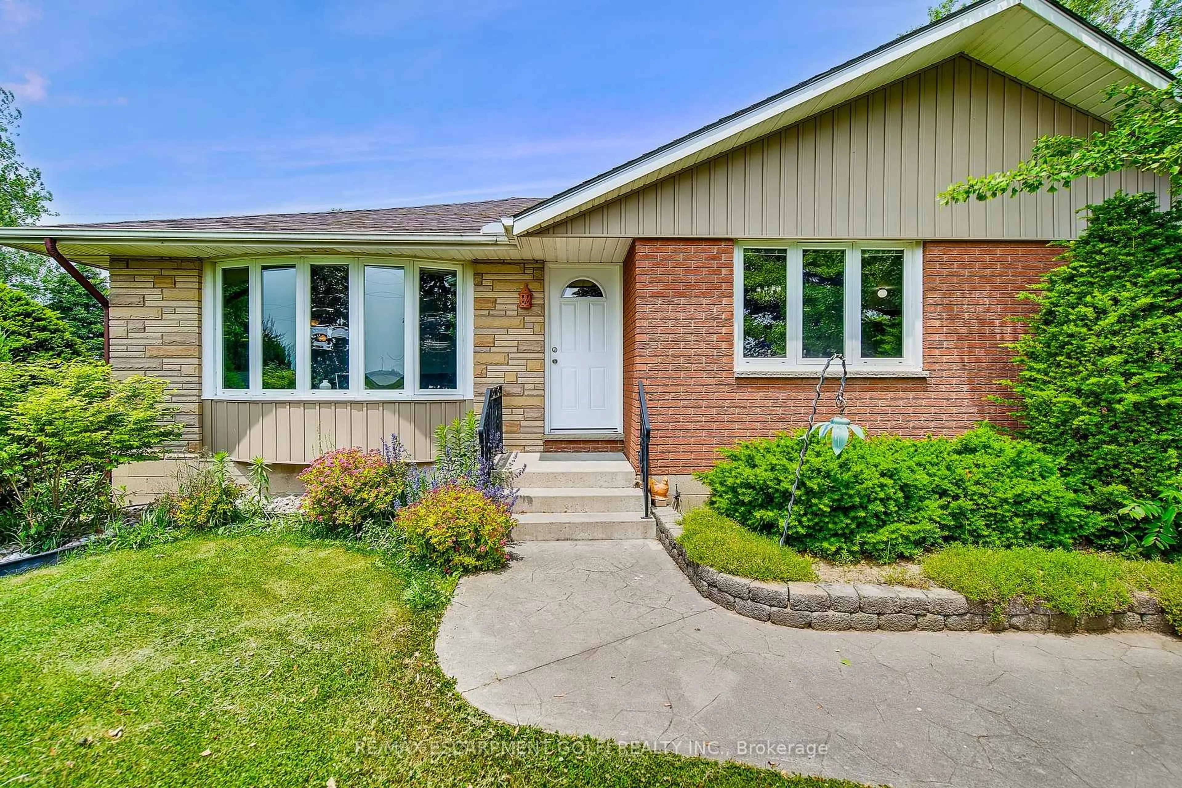 Home with brick exterior material, street for 2535 Highway 3, Haldimand Ontario N0A 1J0