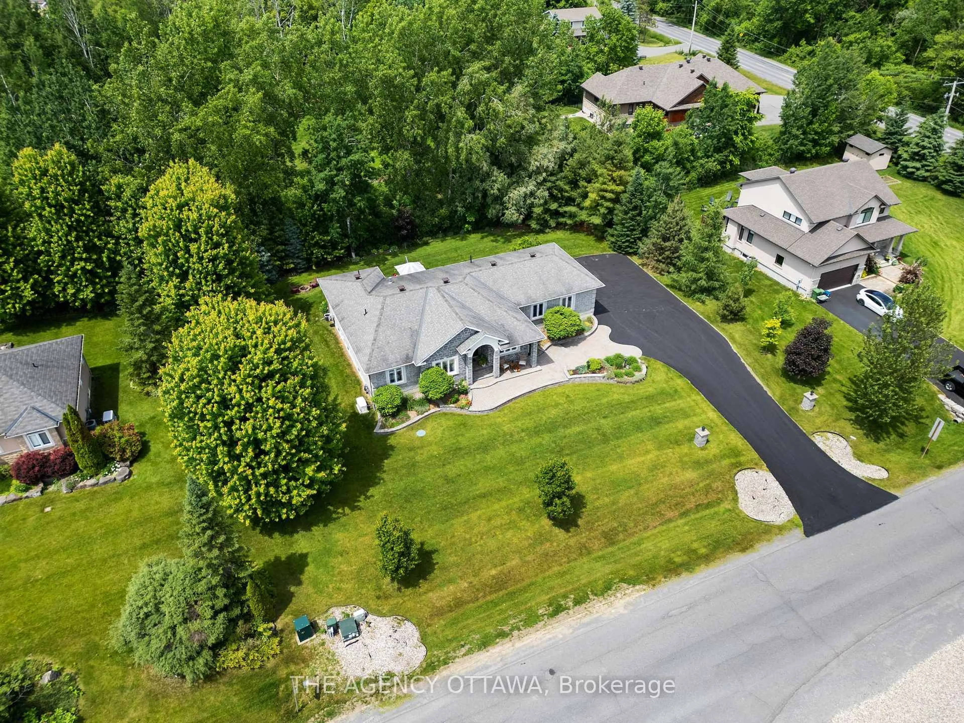 A pic from outside/outdoor area/front of a property/back of a property/a pic from drone, street for 6957 Lake Forest Walk, Greely Ontario K4P 0A3