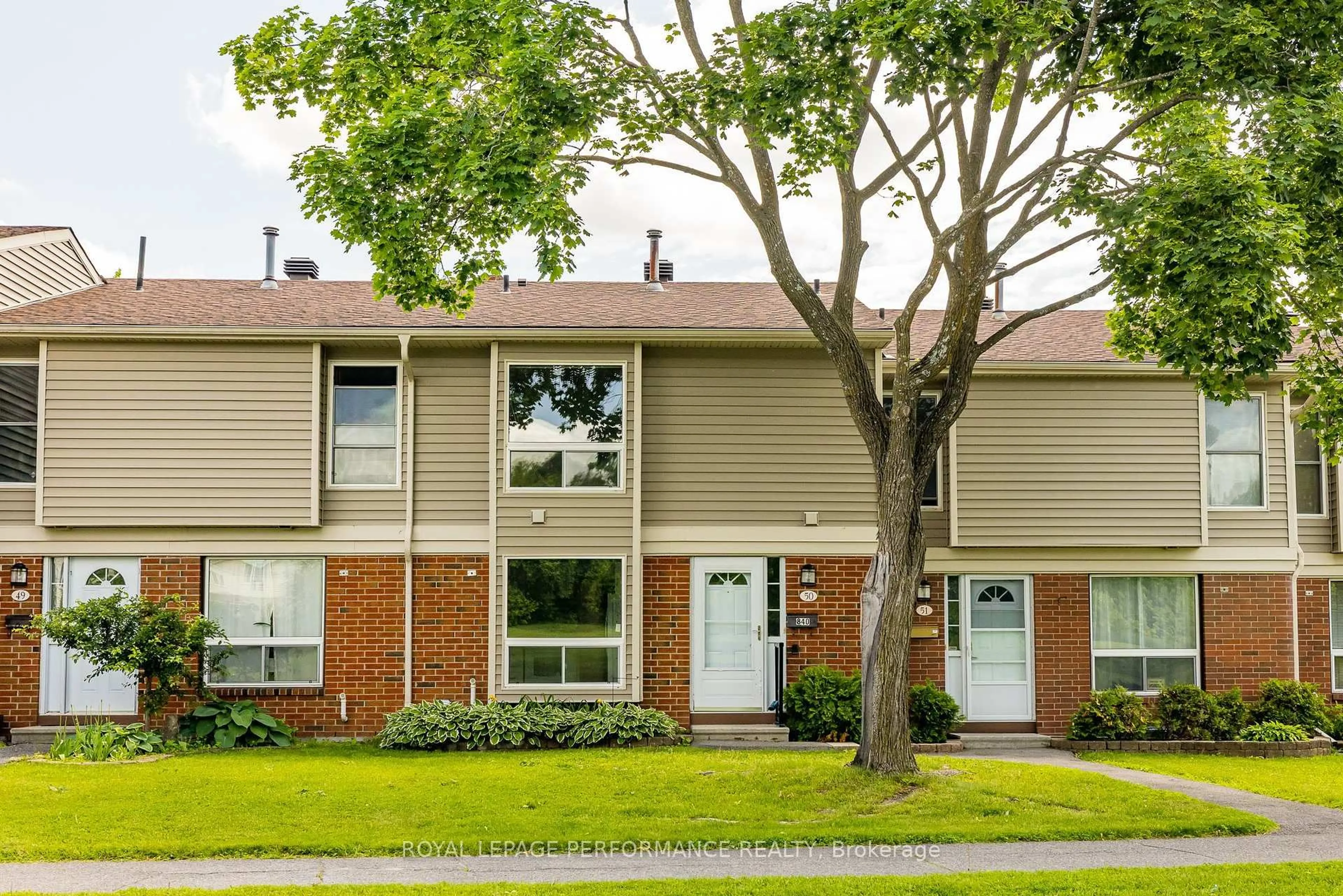 Home with vinyl exterior material, street for 840 Cahill Dr #50, Ottawa Ontario K1V 9K5