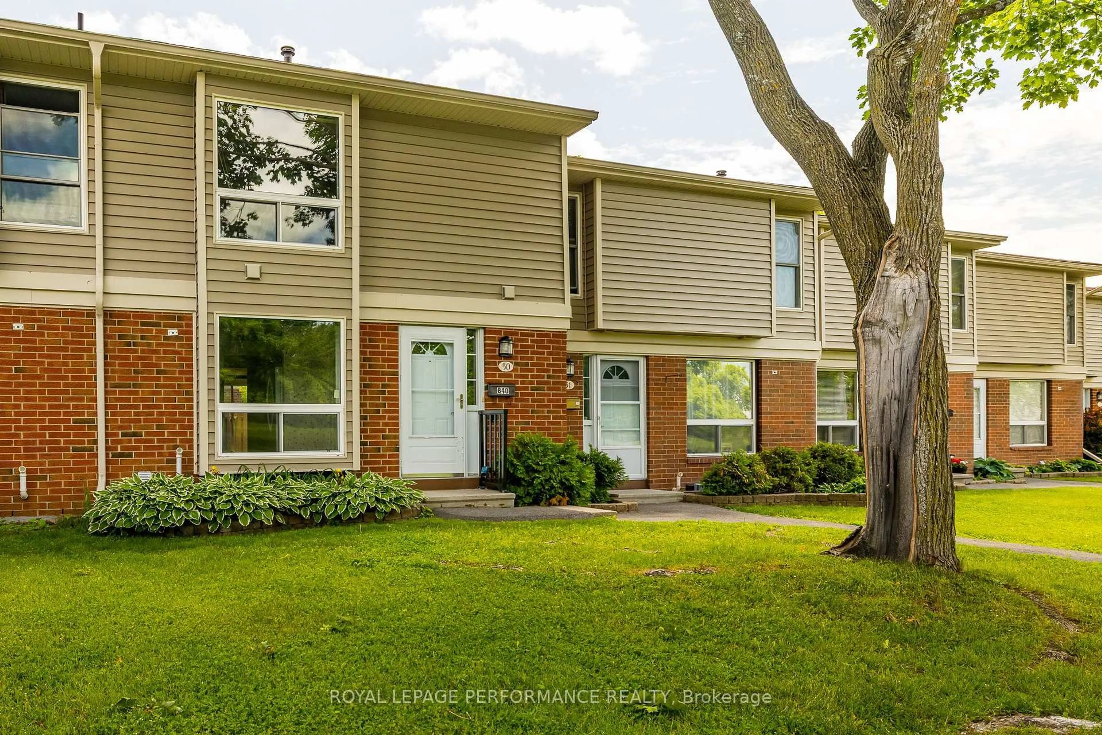 Home with brick exterior material, street for 840 Cahill Dr #50, Ottawa Ontario K1V 9K5