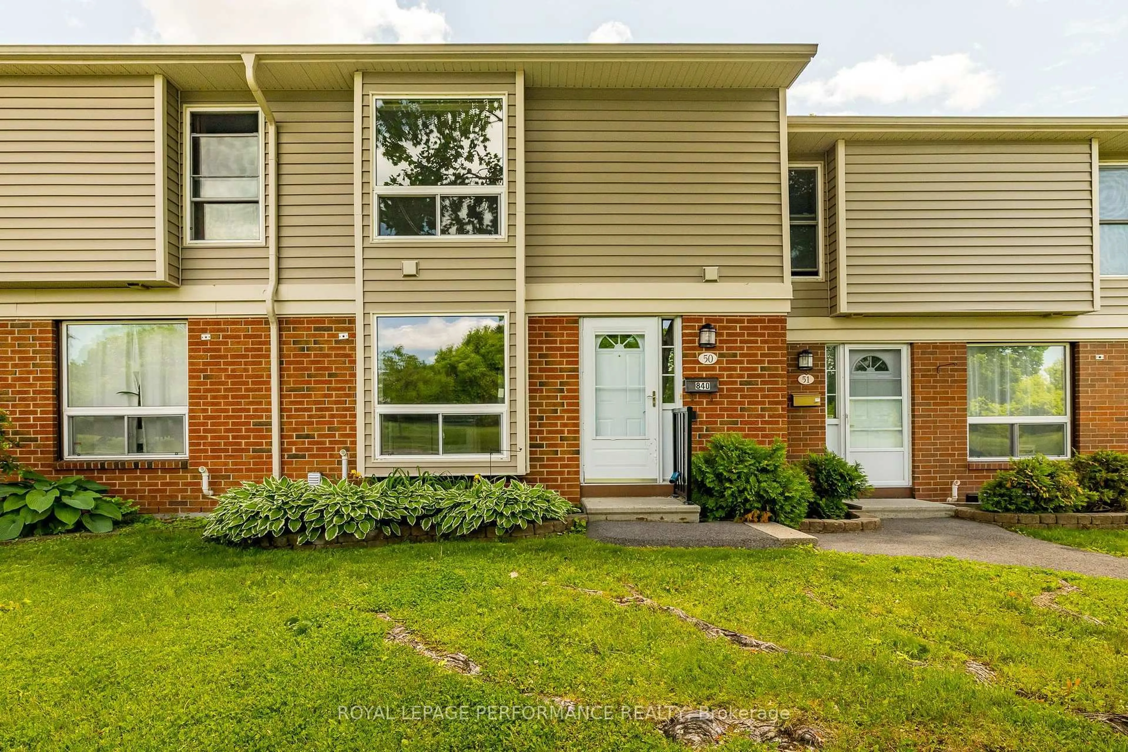 Home with brick exterior material, street for 840 Cahill Dr #50, Ottawa Ontario K1V 9K5