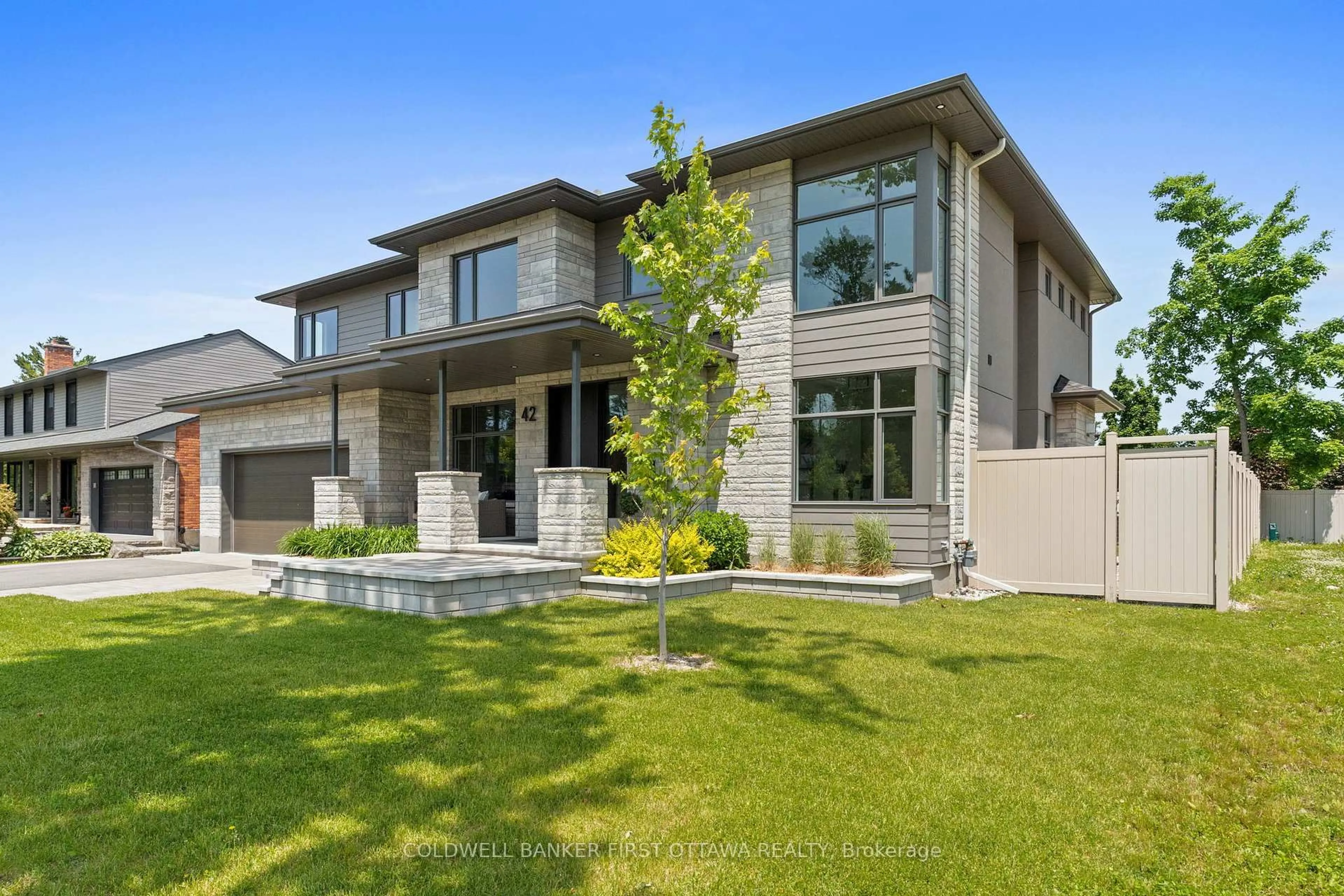 Home with vinyl exterior material, street for 42 Parkland Cres, Ottawa Ontario K2H 7W5