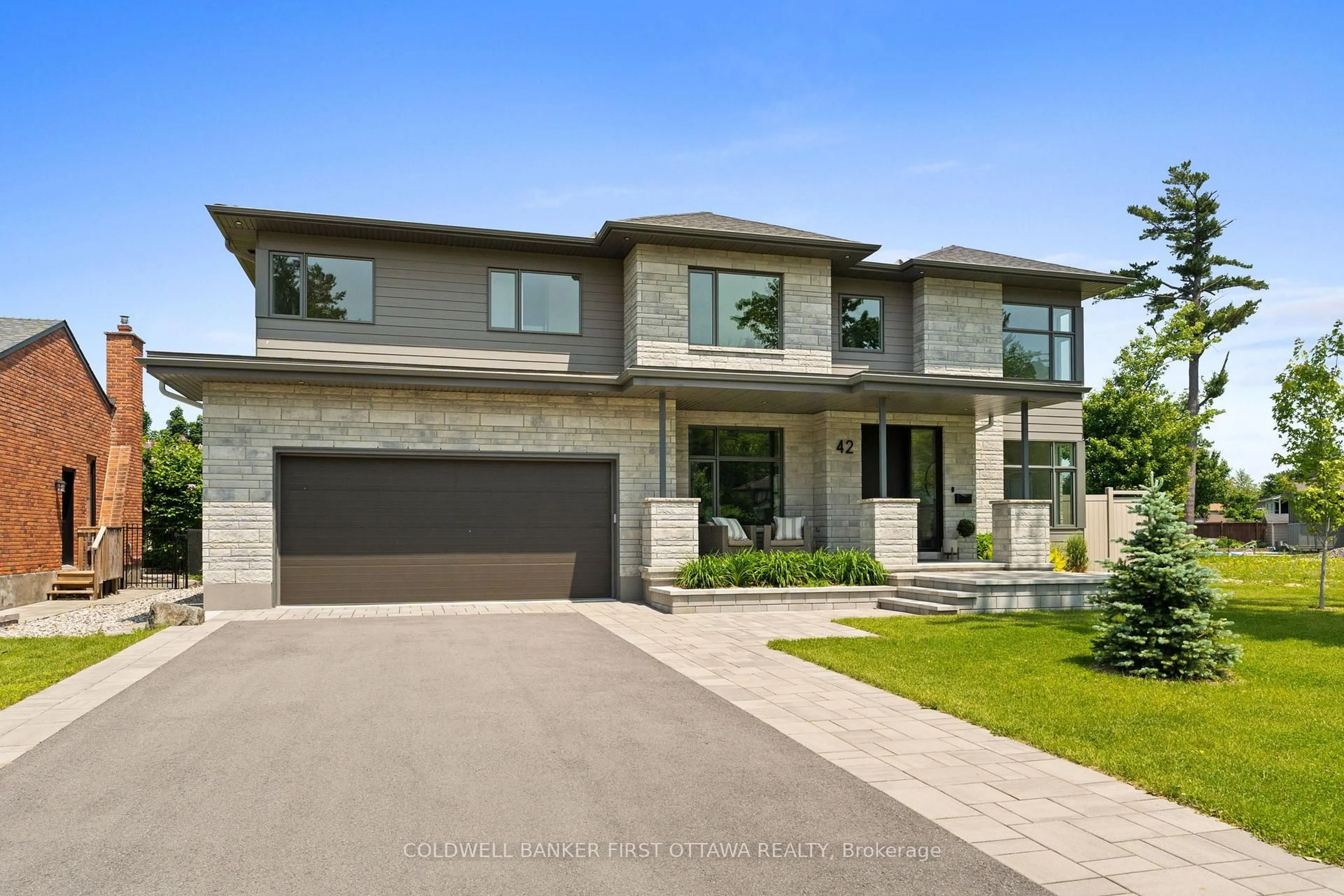 Home with brick exterior material, street for 42 Parkland Cres, Ottawa Ontario K2H 7W5