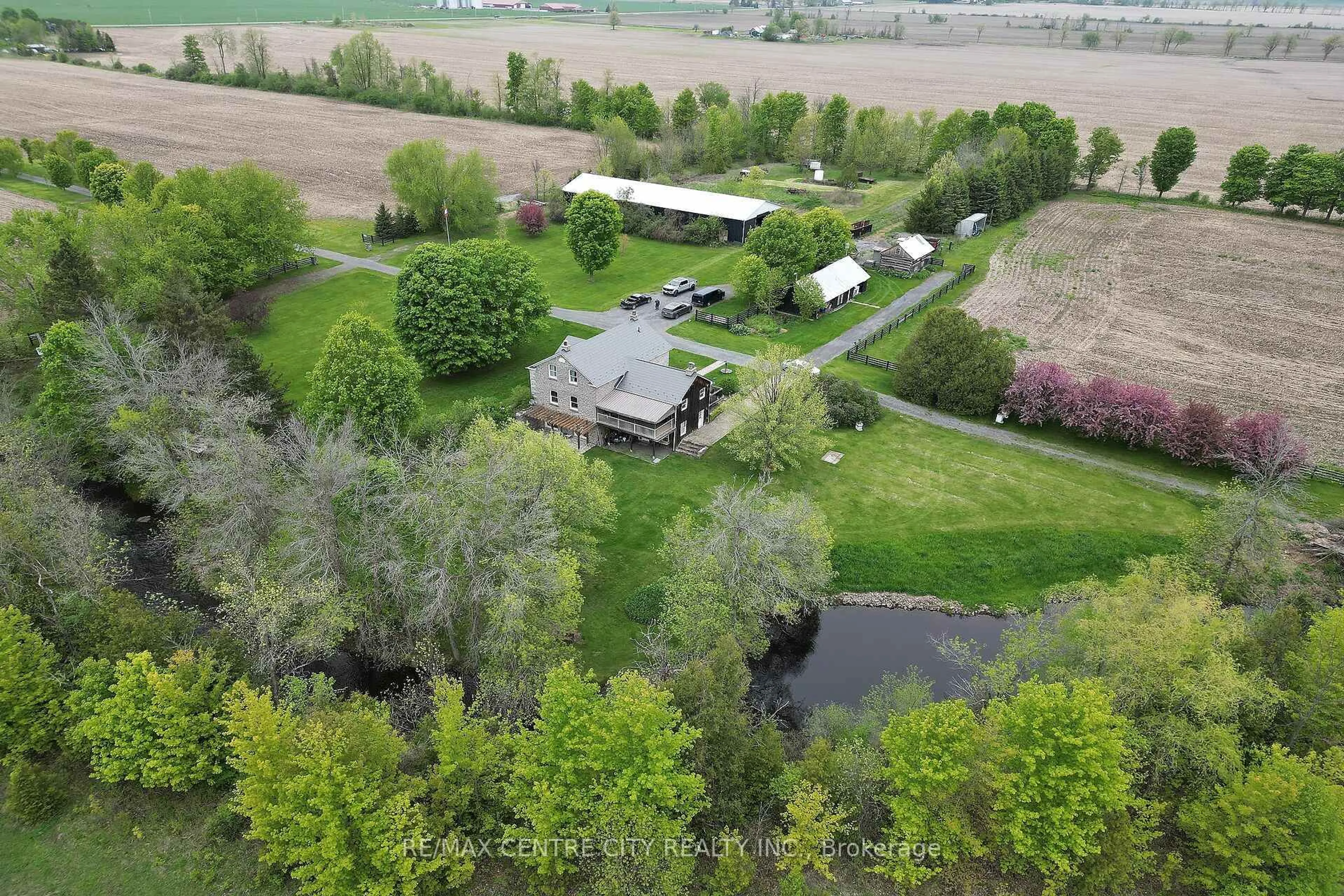 A pic from outside/outdoor area/front of a property/back of a property/a pic from drone, water/lake/river/ocean view for 3000 Roger Stevens Rd, North Gower Ontario K0A 2T0