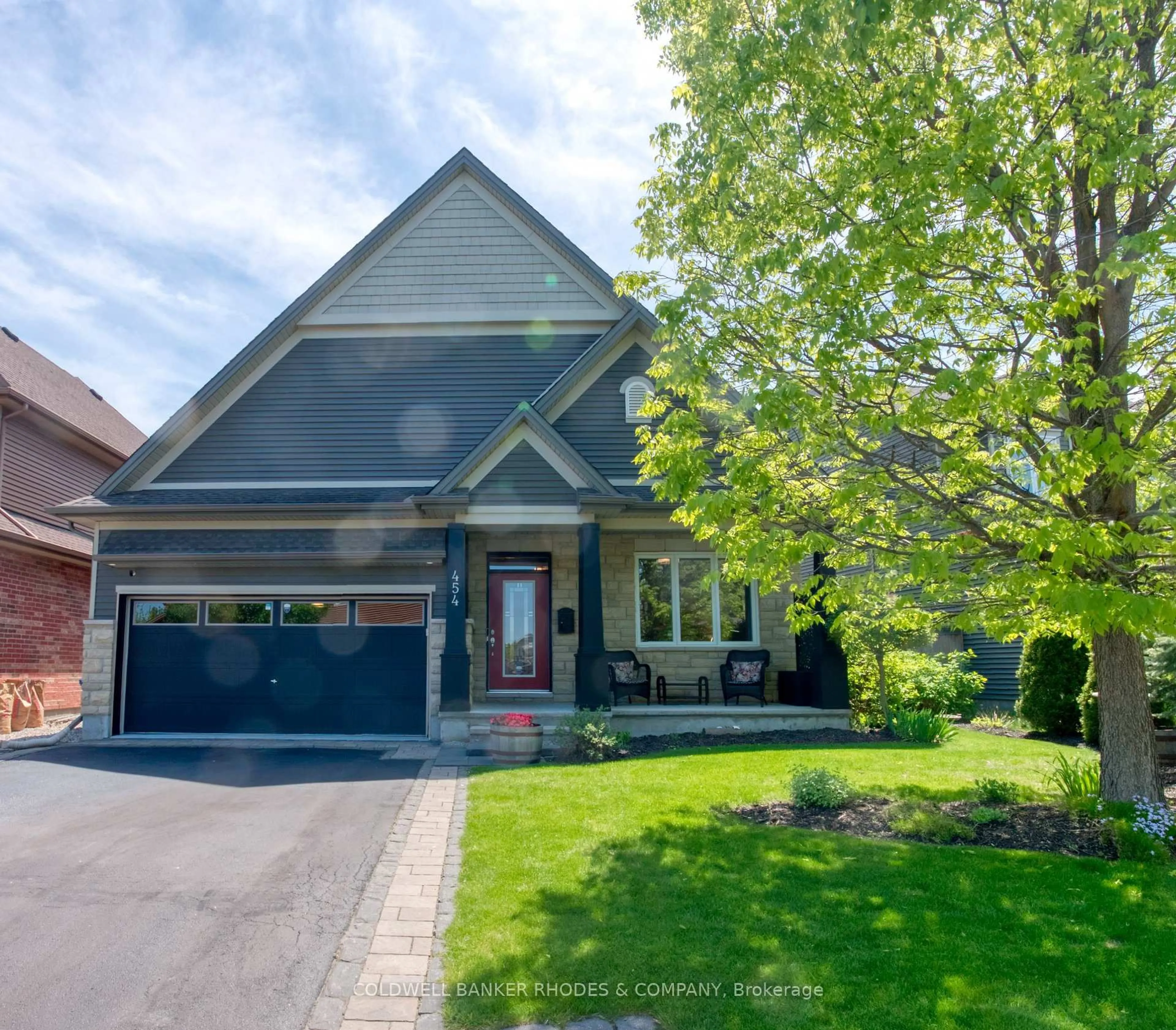 Home with brick exterior material, street for 454 Creekview Way, Ottawa Ontario K1T 0J5