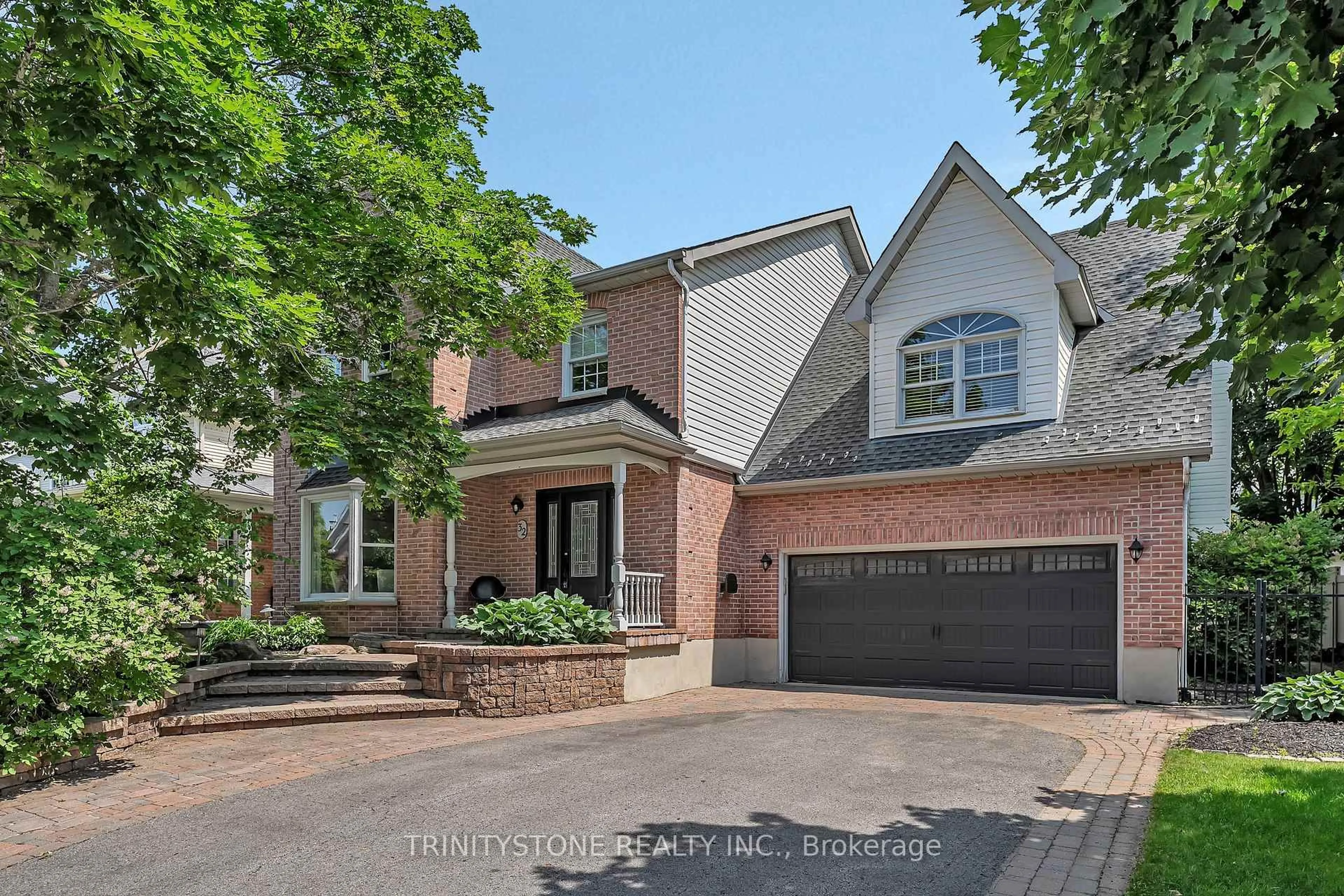 Home with brick exterior material, street for 32 Kyle Ave, Stittsville Ontario K2S 1G9