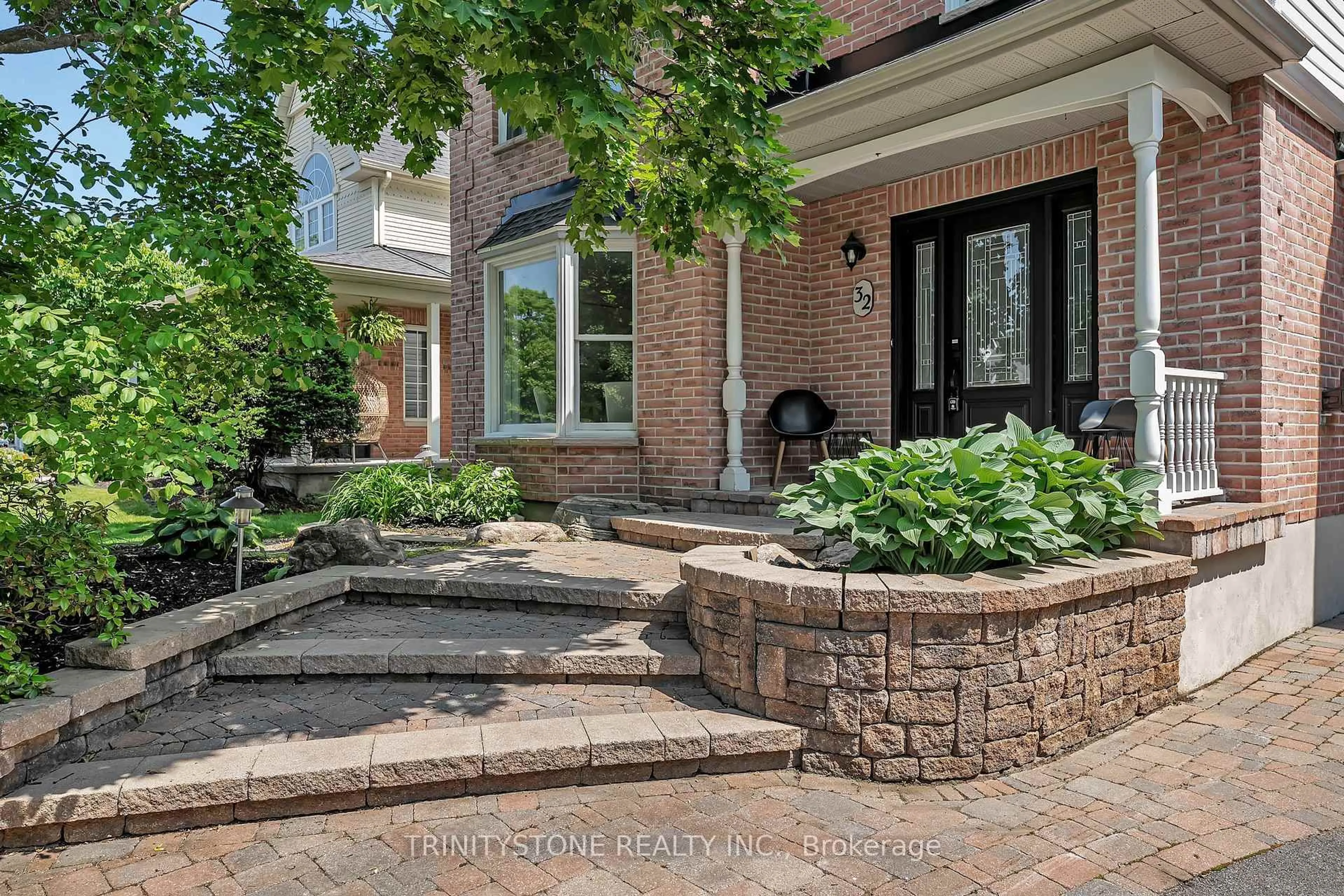 Home with brick exterior material, street for 32 Kyle Ave, Stittsville Ontario K2S 1G9