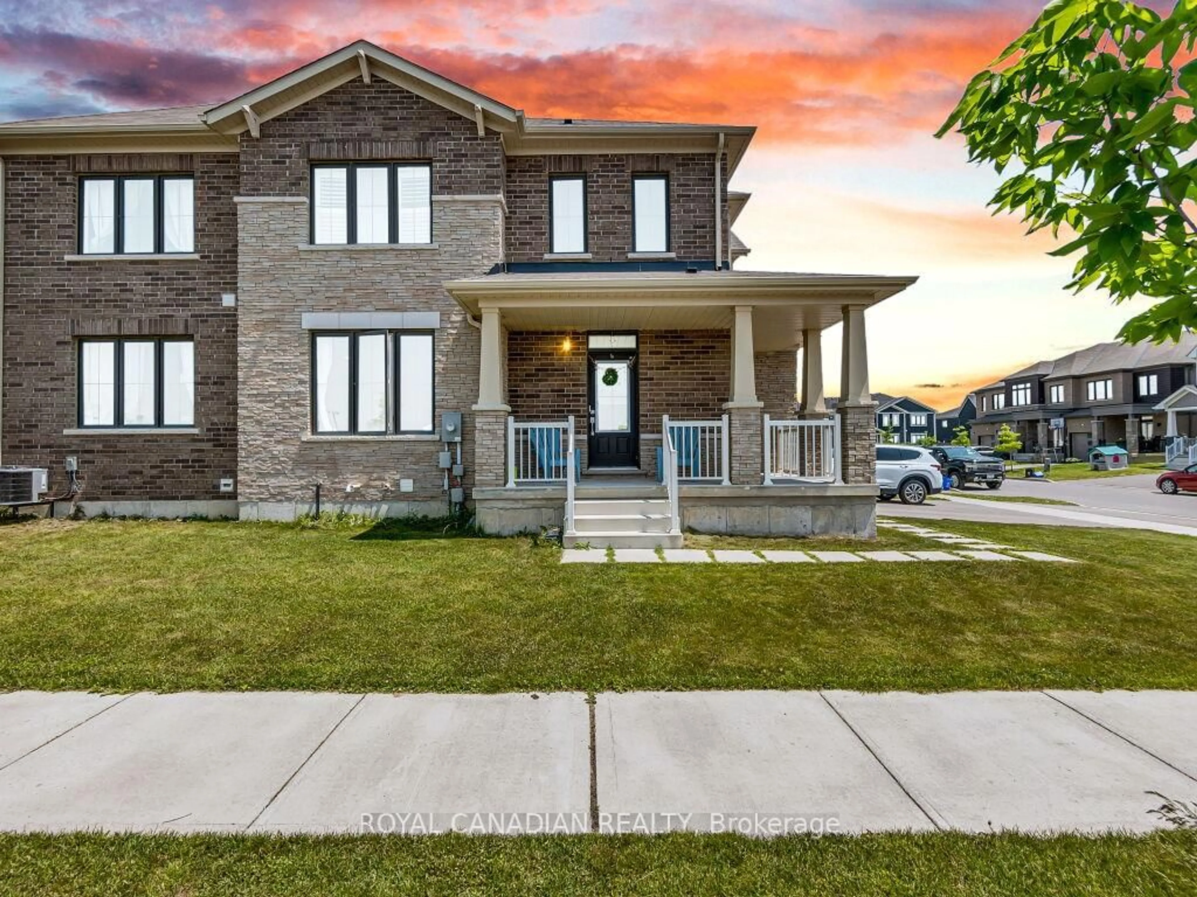 Home with brick exterior material, street for 104 Oaktree Dr, Haldimand Ontario N3W 0E5