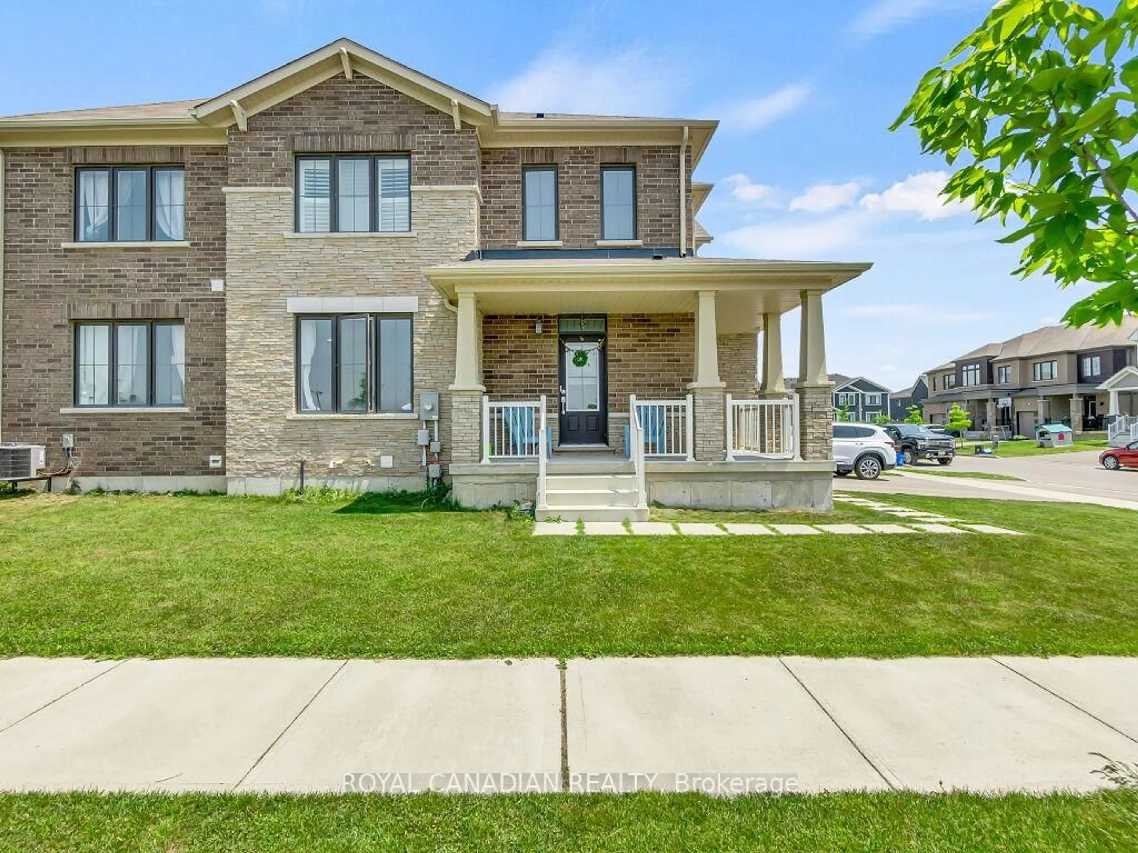 Home with brick exterior material, street for 104 Oaktree Dr, Haldimand Ontario N3W 0E5