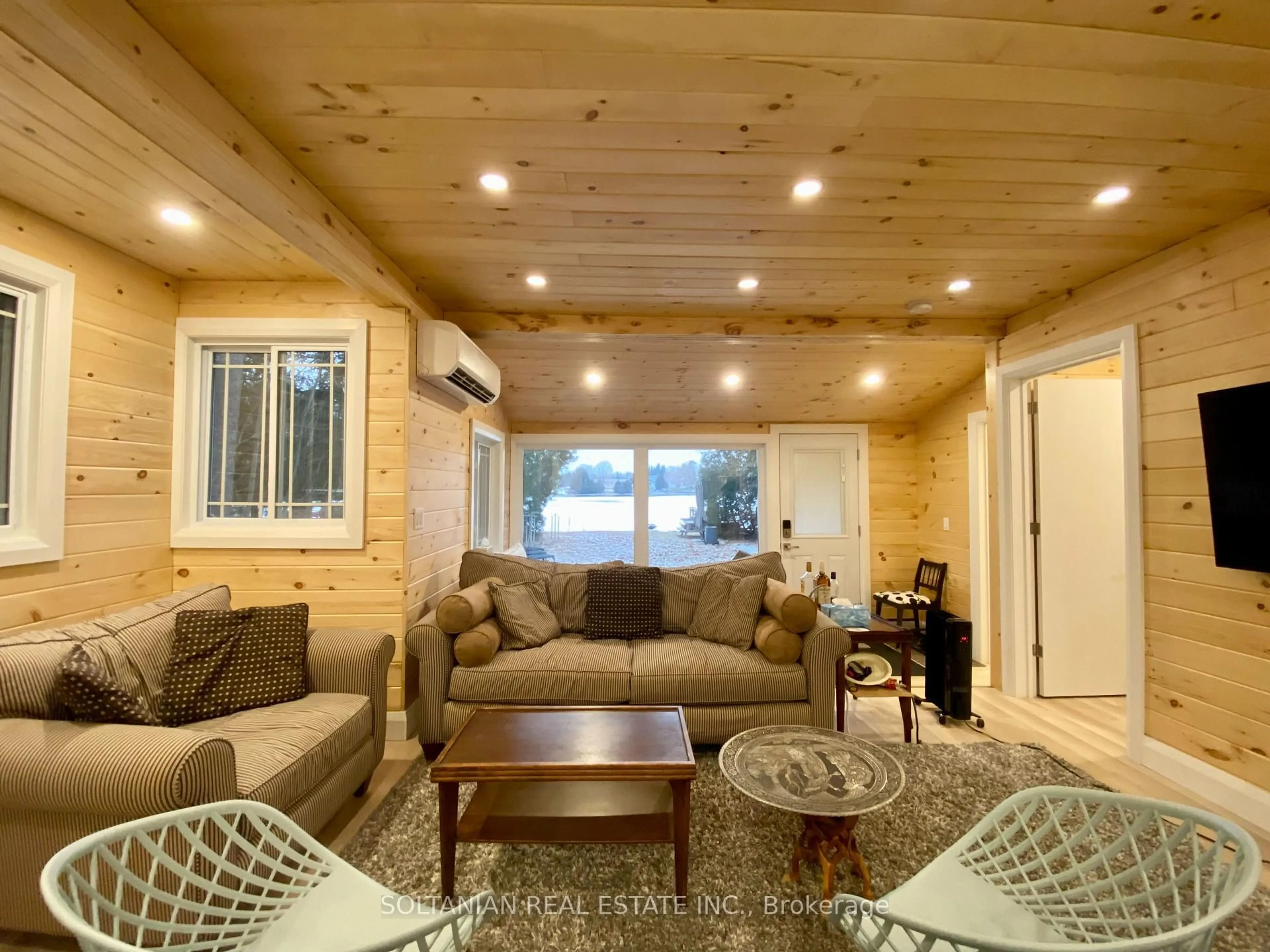 Living room with furniture, wood/laminate floor for 29 Paradise Rd, Kawartha Lakes Ontario K0M 1B0