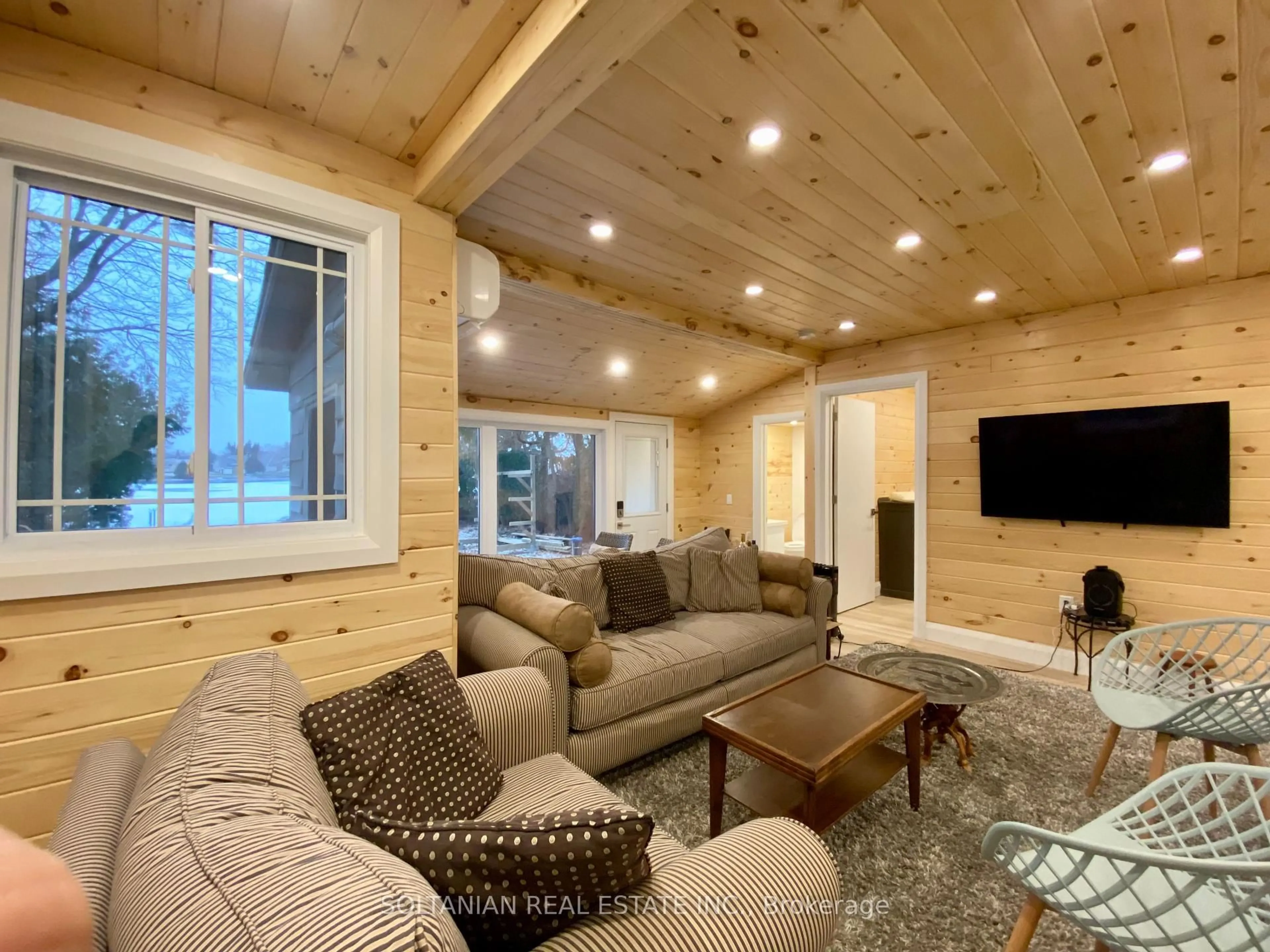 Living room with furniture, wood/laminate floor for 29 Paradise Rd, Kawartha Lakes Ontario K0M 1B0