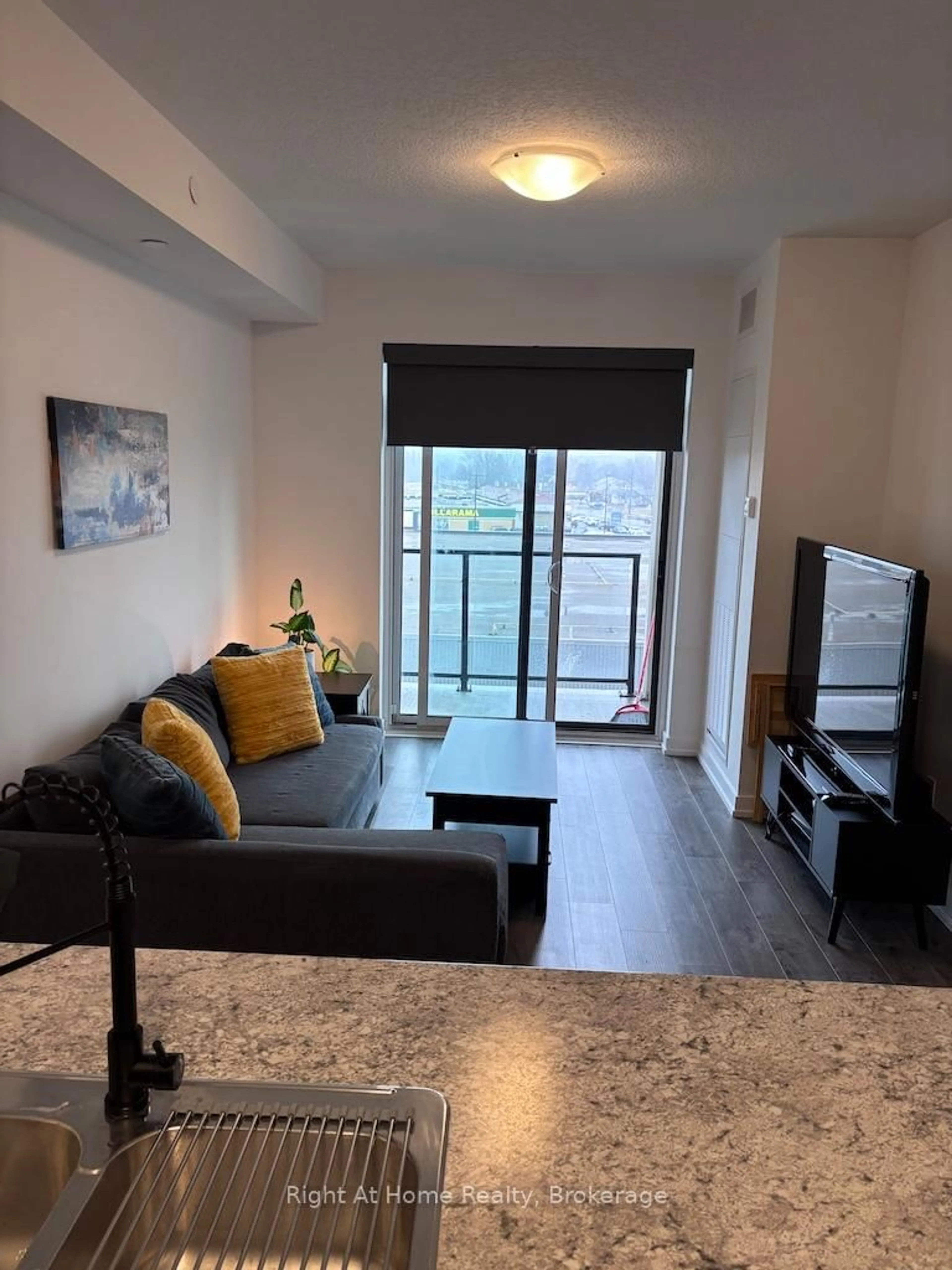 Living room with furniture, unknown for 5055 Greenlane Rd #416, Lincoln Ontario L3J 2J3