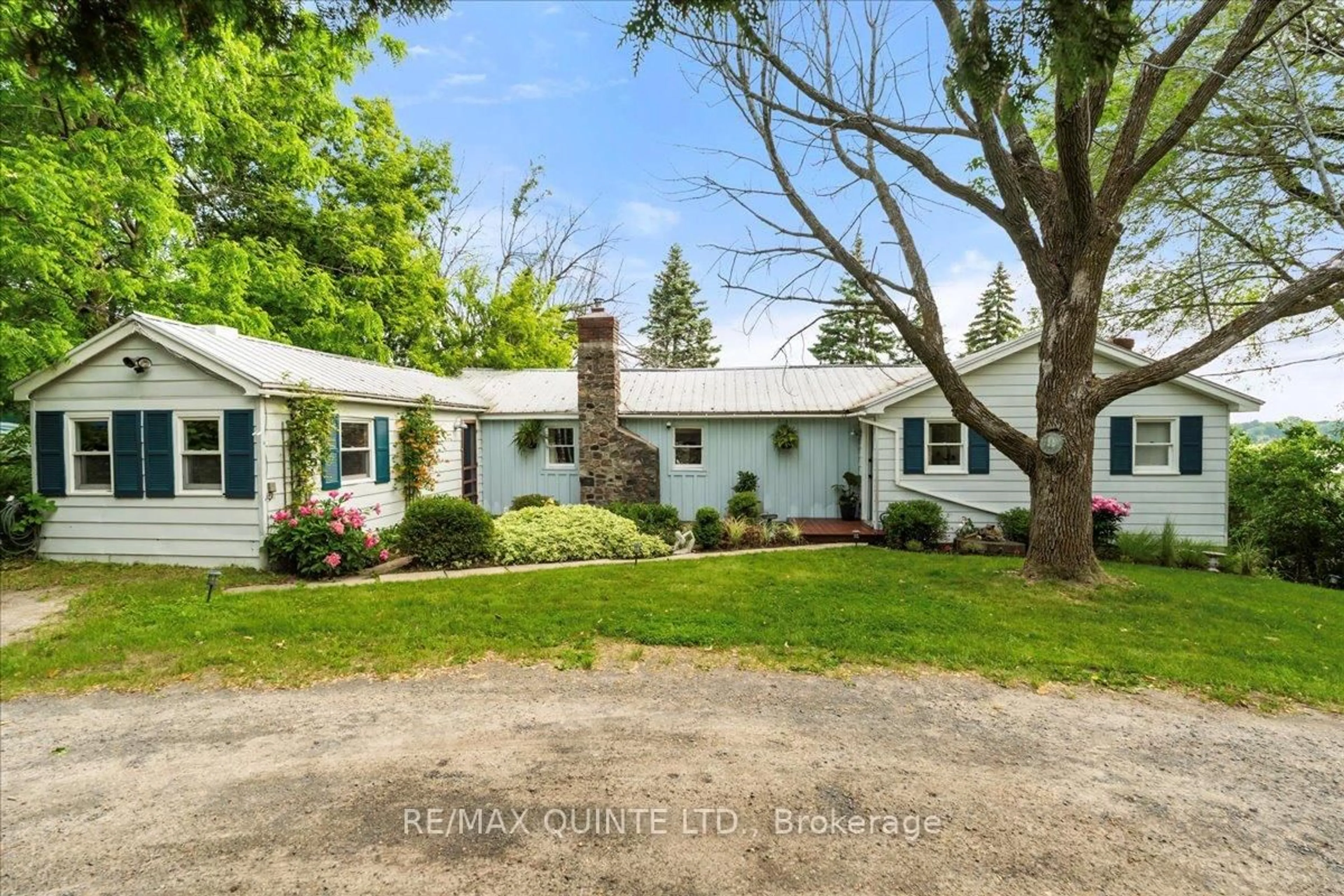A pic from outside/outdoor area/front of a property/back of a property/a pic from drone, street for 11364 Loyalist Pkwy, Prince Edward County Ontario K0K 2T0