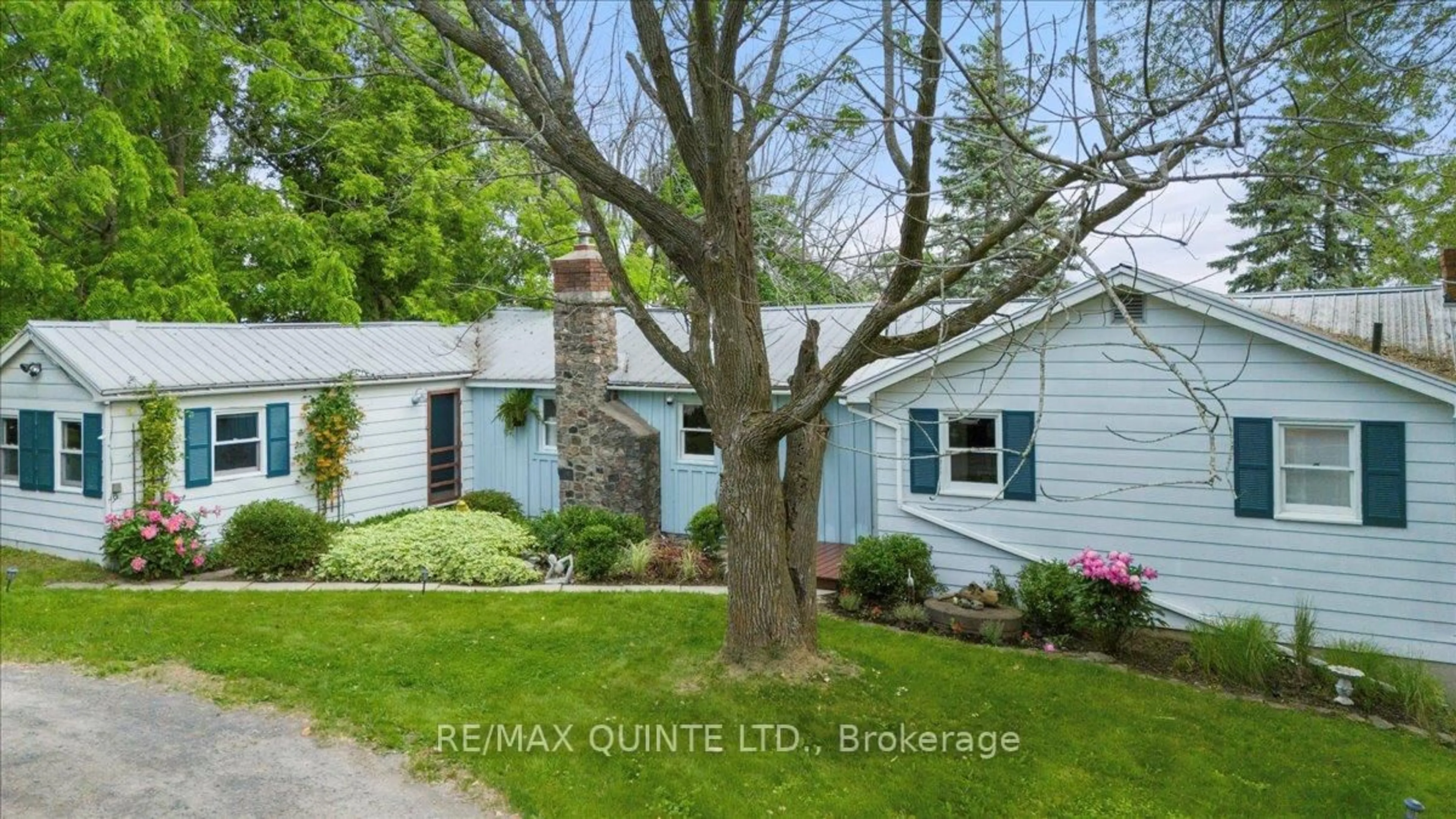 Home with vinyl exterior material, street for 11364 Loyalist Pkwy, Prince Edward County Ontario K0K 2T0