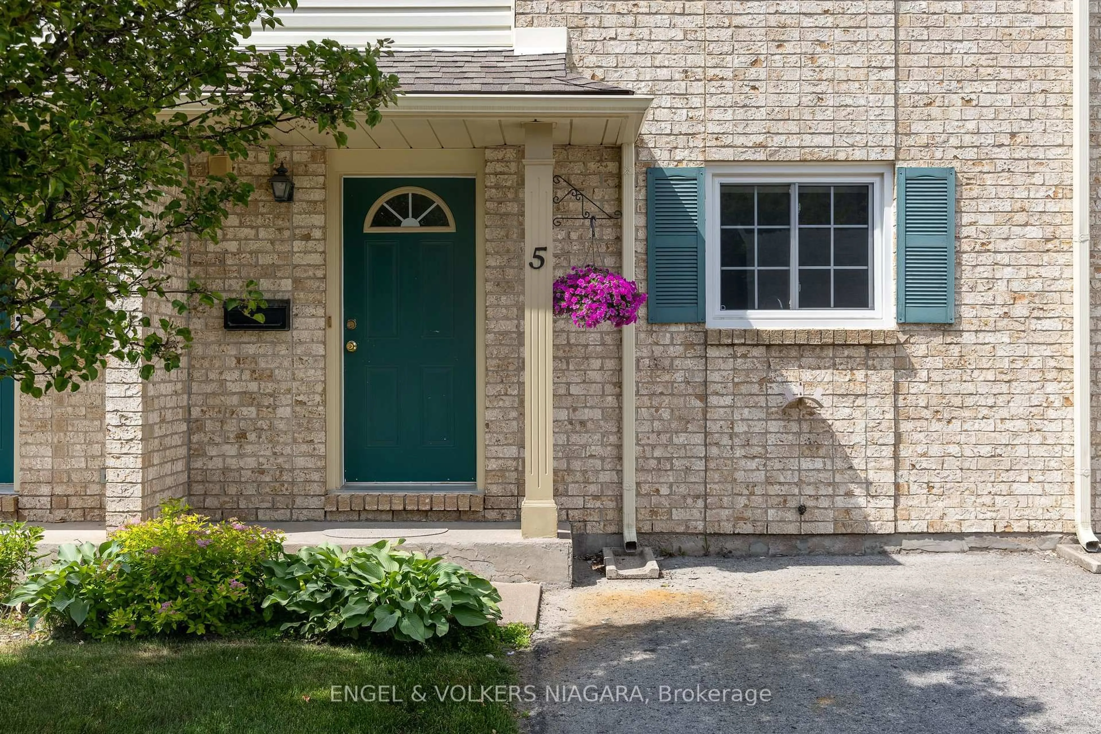 Home with brick exterior material, street for 7470 Monastery Dr #5, Niagara Falls Ontario L2H 3B3