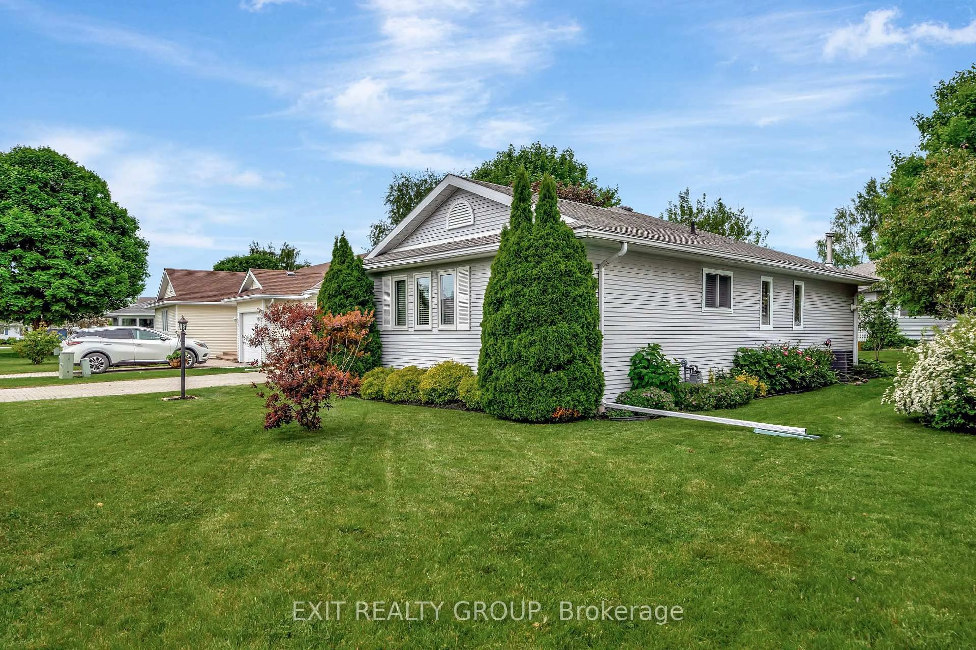 A pic from outside/outdoor area/front of a property/back of a property/a pic from drone, street for 5 Cretney Dr, Prince Edward County Ontario K0K 3L0