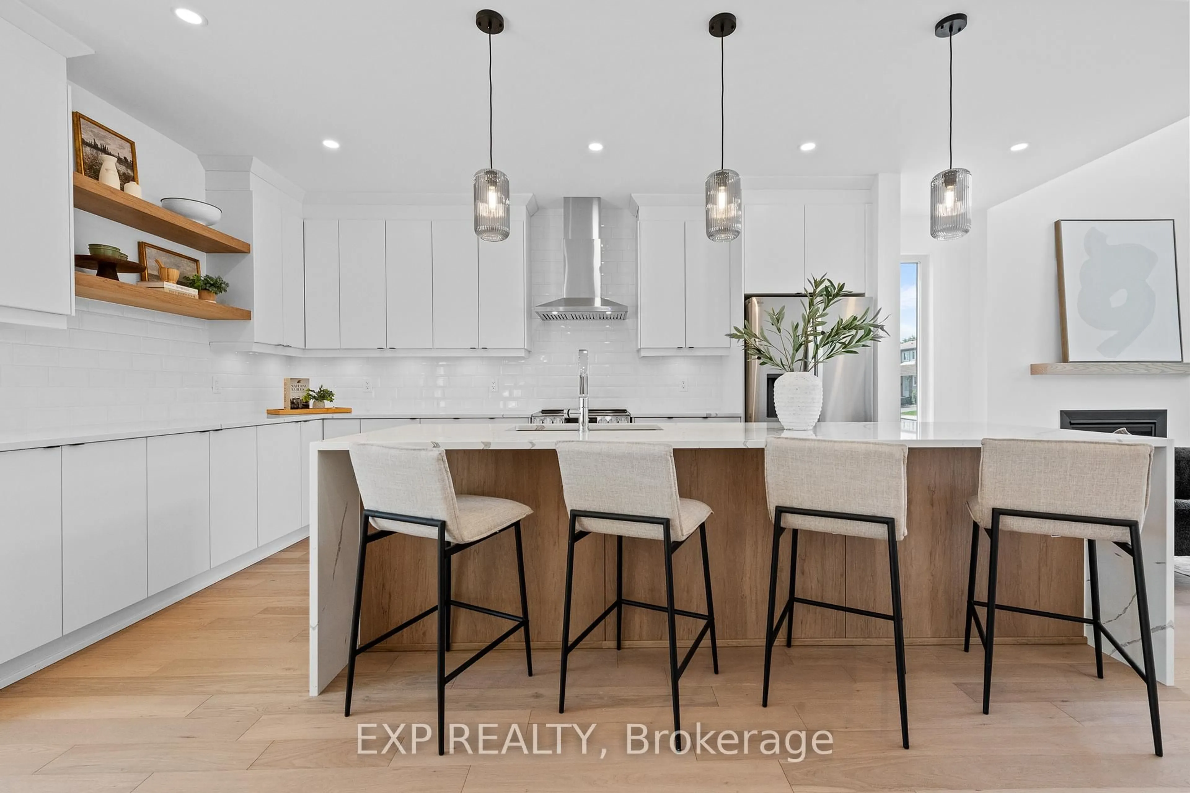 Open concept kitchen, wood/laminate floor for 495 Duvernay Dr, Ottawa Ontario K1E 2N7