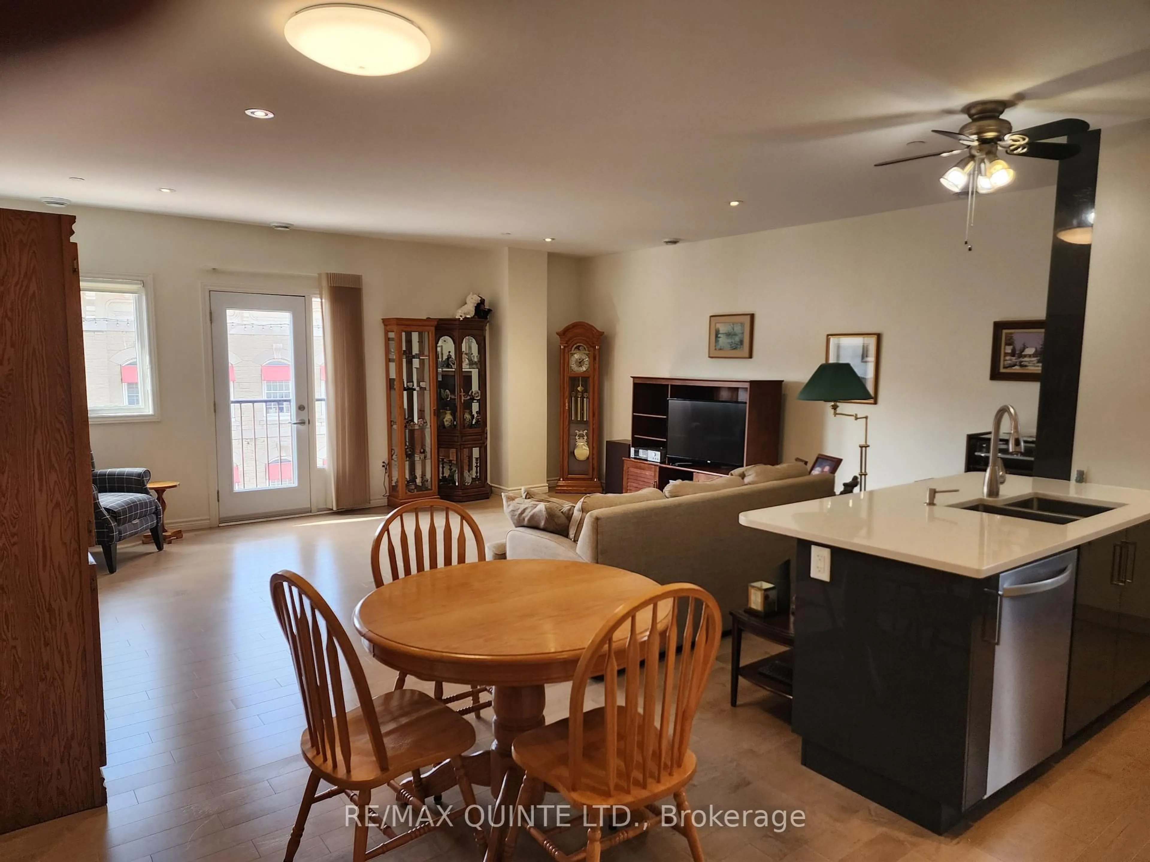Open concept kitchen, wood/laminate floor for 199 Front St #304, Belleville Ontario K8N 5H5