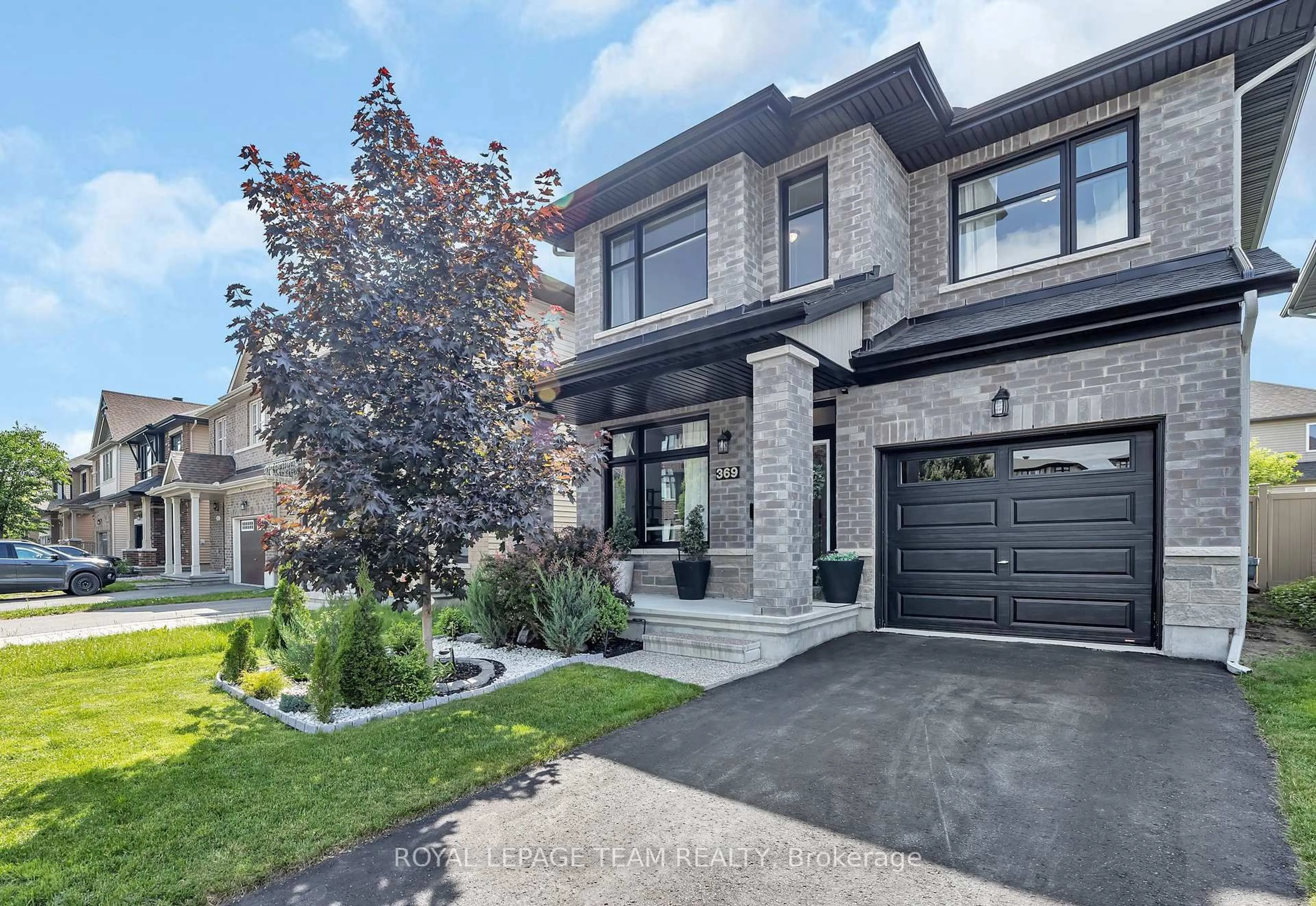 Home with brick exterior material, street for 369 Twinflower Way, Ottawa Ontario K2J 5Z5