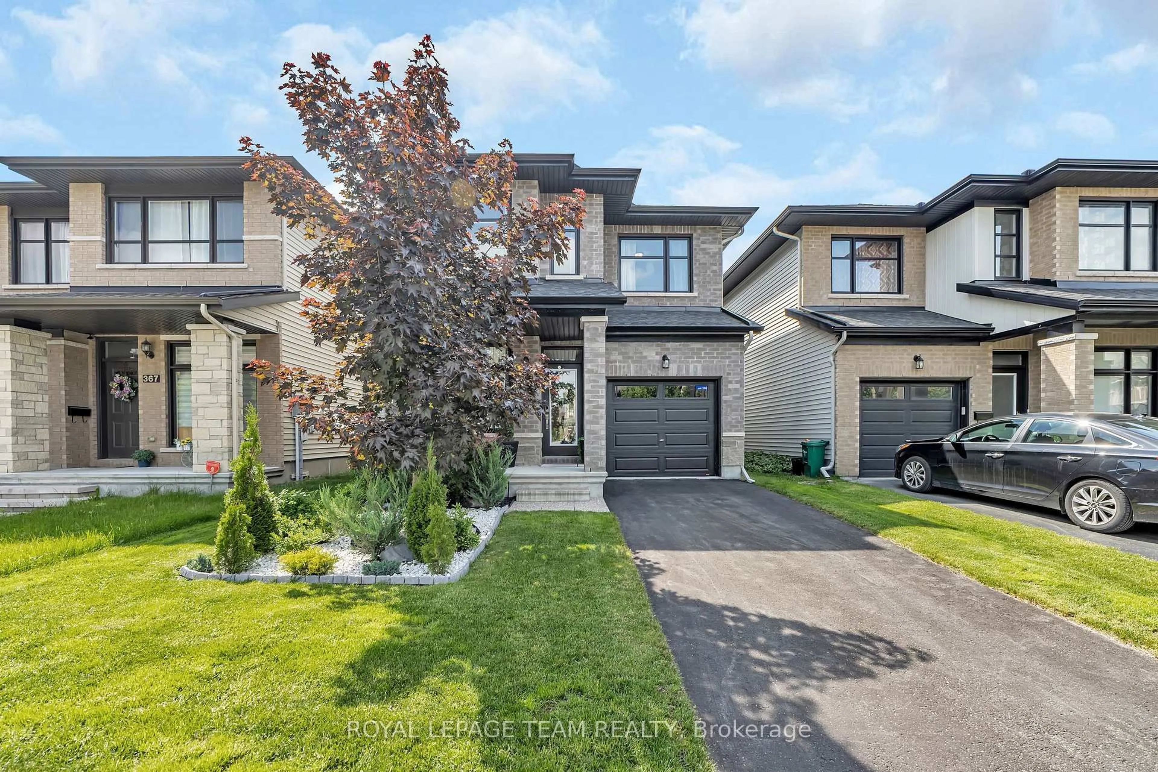 Home with brick exterior material, street for 369 Twinflower Way, Ottawa Ontario K2J 5Z5