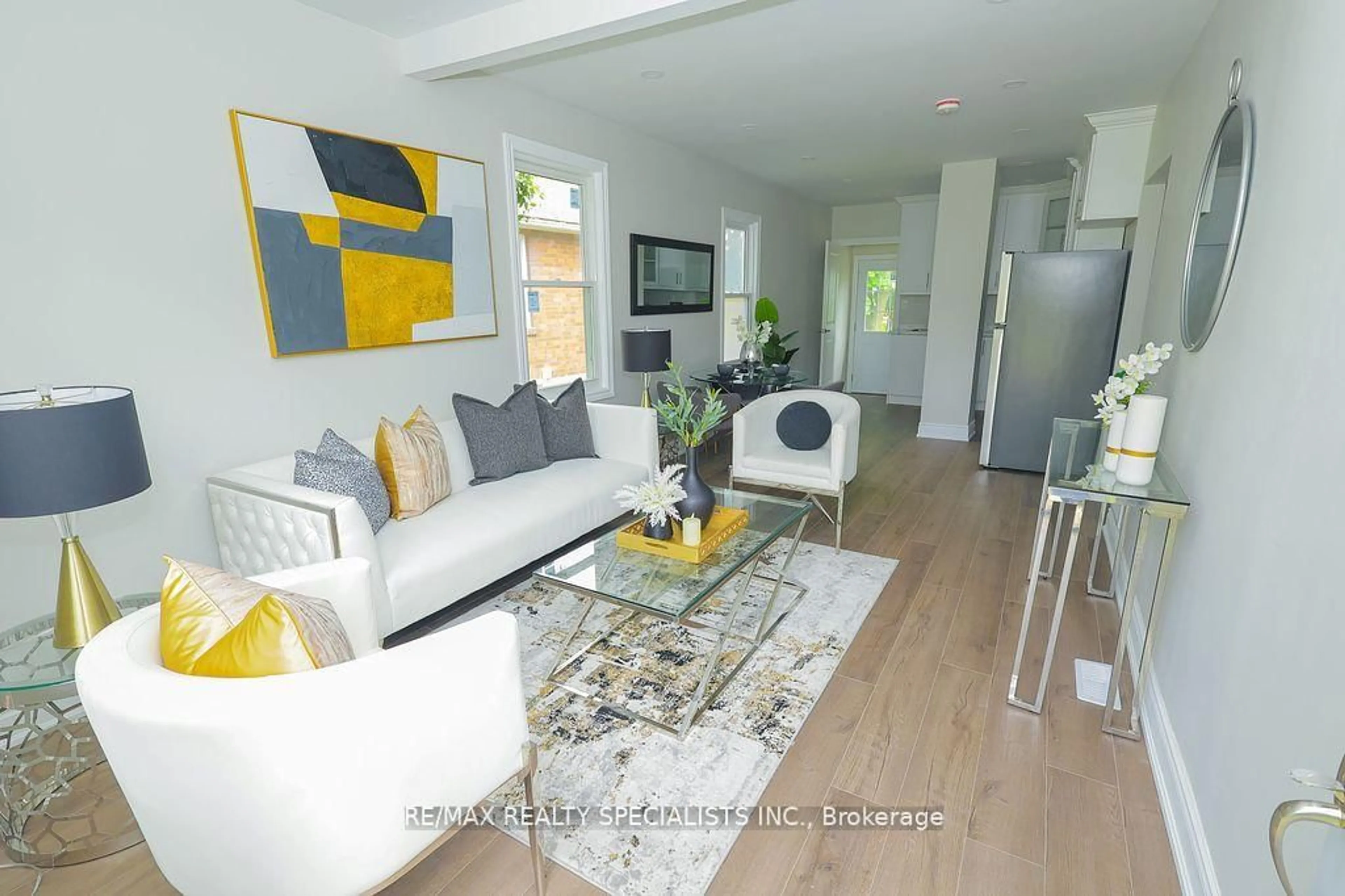 Living room with furniture, wood/laminate floor for 5920 Symmes St, Niagara Falls Ontario L2G 2G5