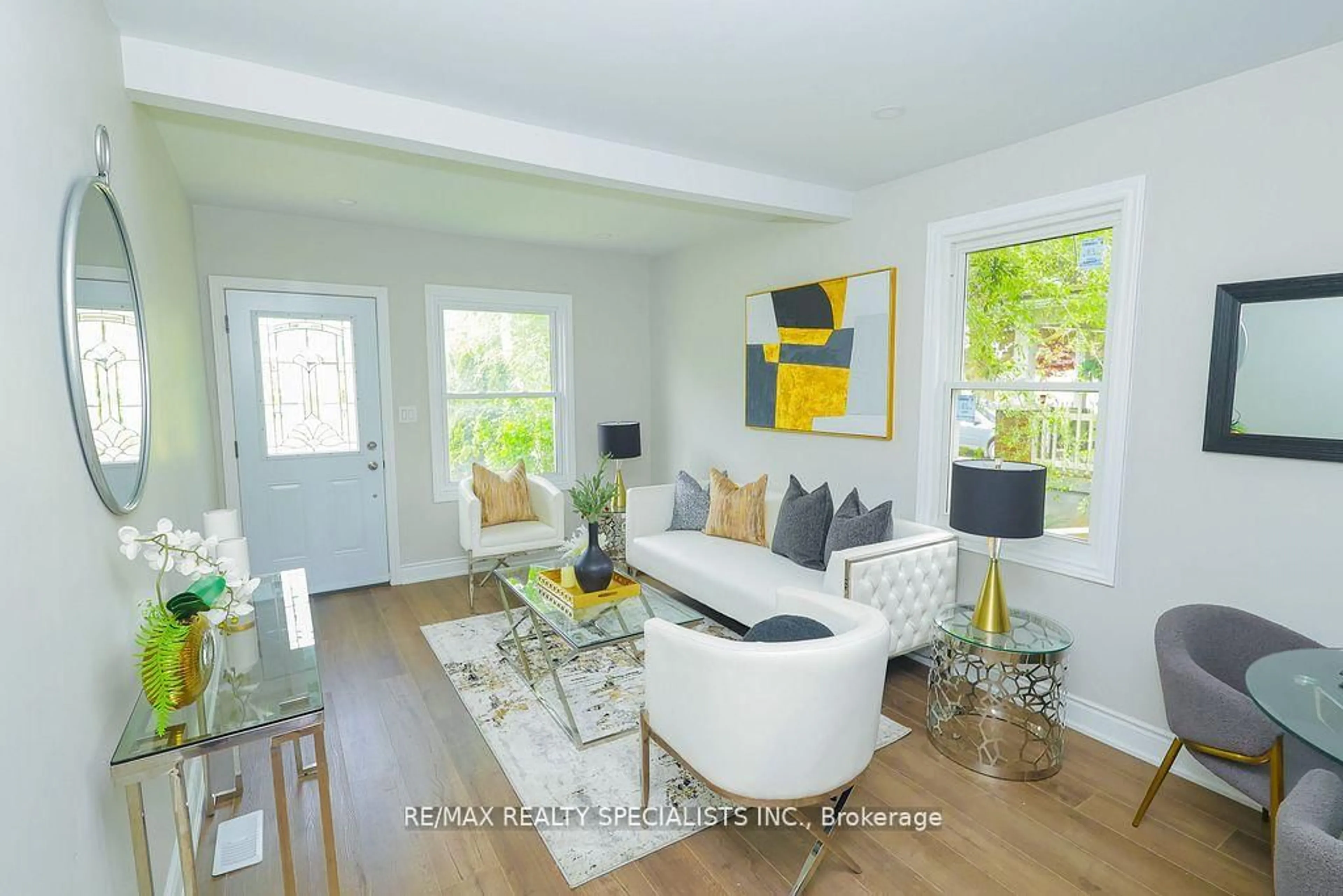 Living room with furniture, wood/laminate floor for 5920 Symmes St, Niagara Falls Ontario L2G 2G5