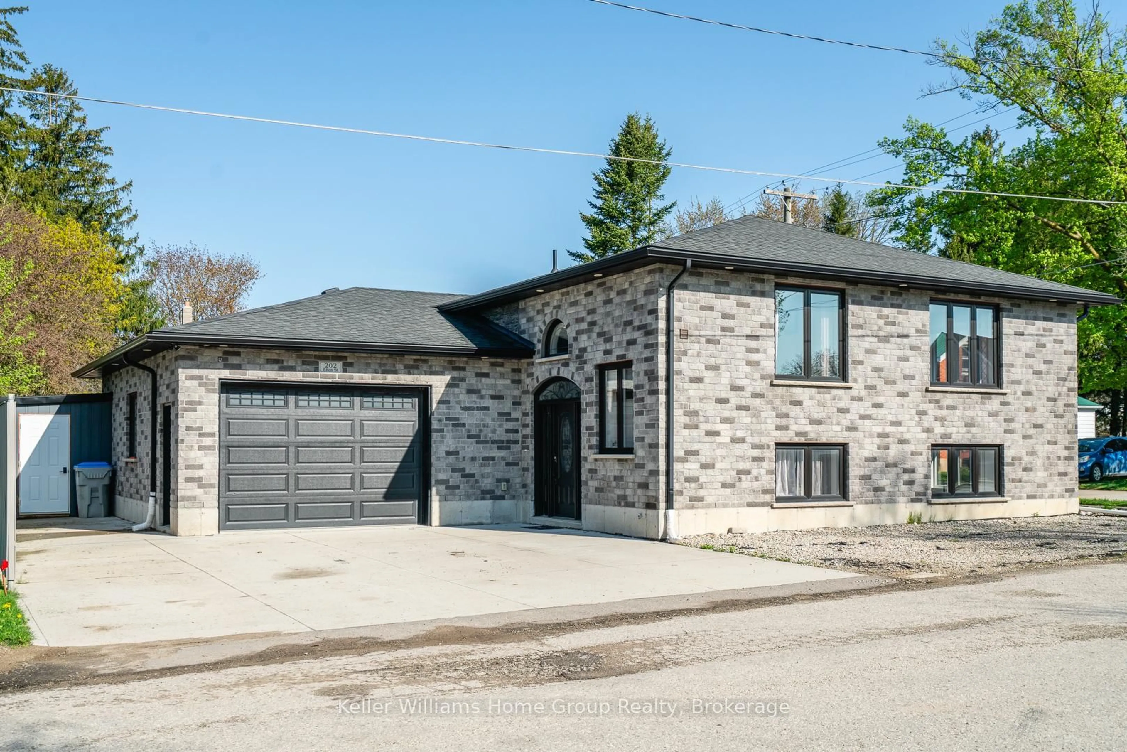 Home with brick exterior material, street for 202 Ellen St, North Perth Ontario N0G 1B0