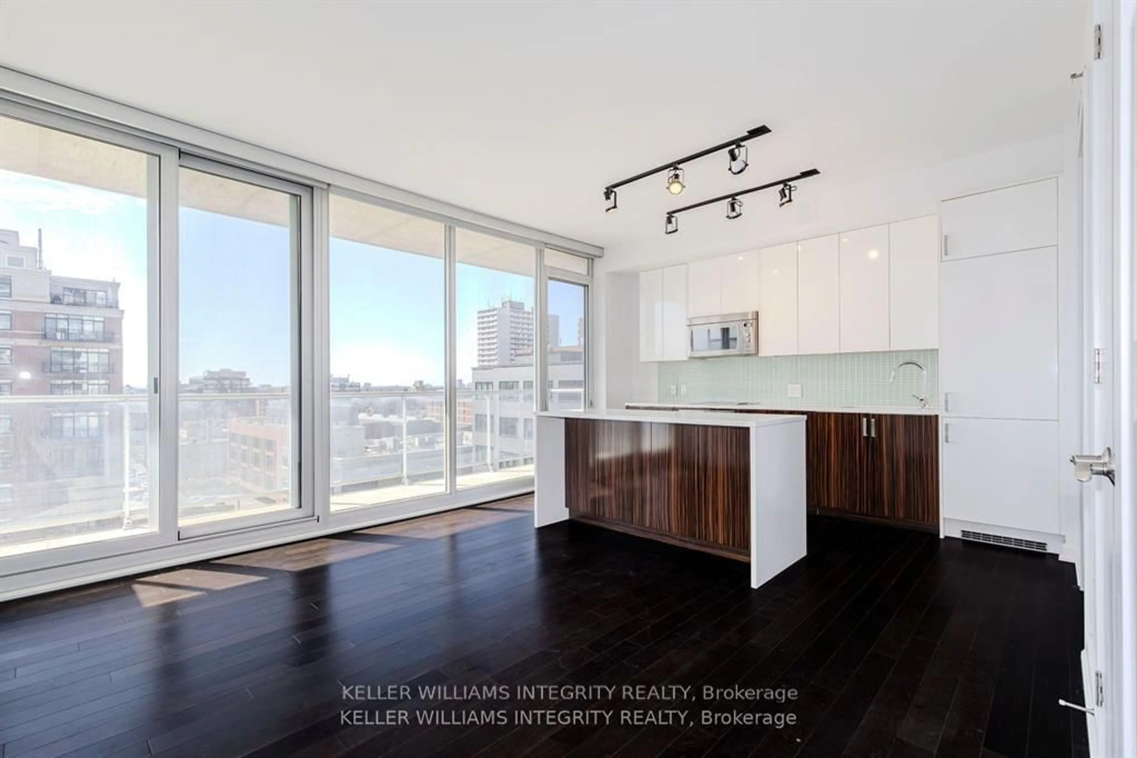 Open concept kitchen, wood/laminate floor for 300 Lisgar St #809, Ottawa Ontario K2P 0E2