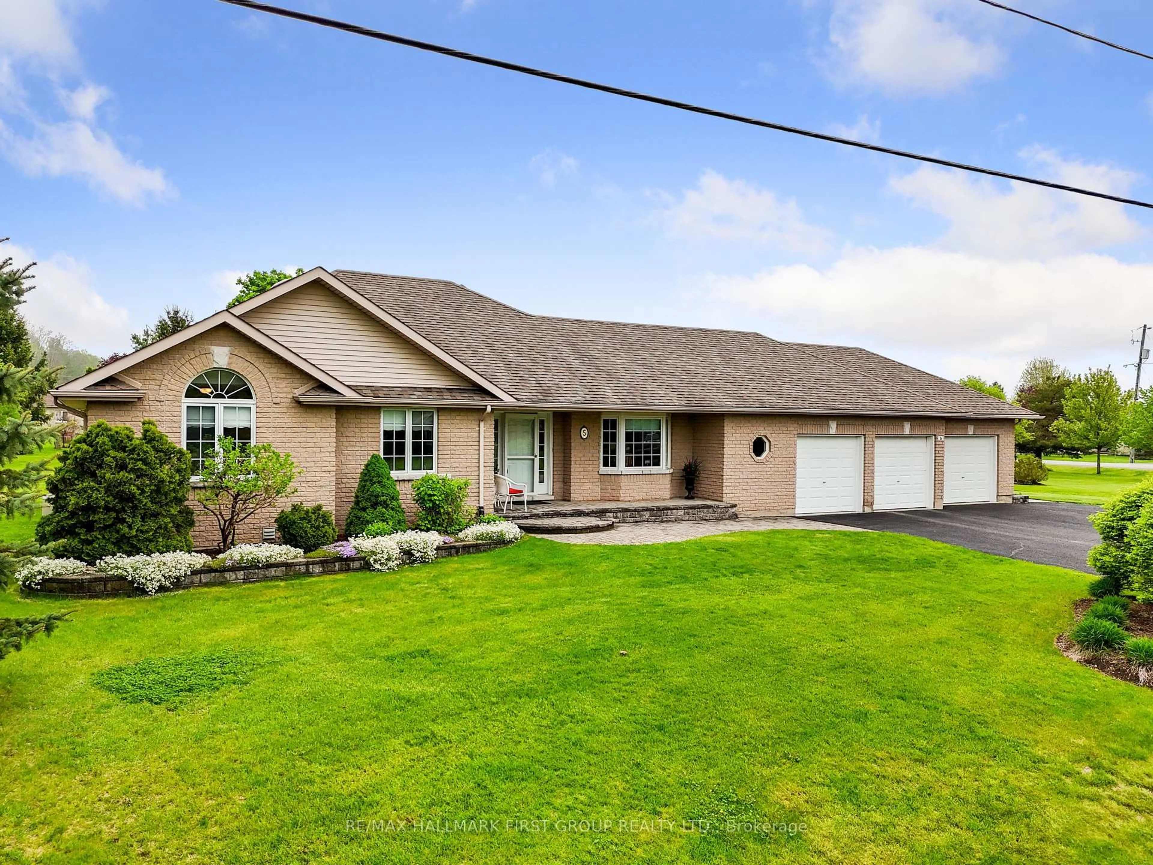 Home with vinyl exterior material, street for 5 Ravine Dr, Hamilton Township Ontario K0K 1C0