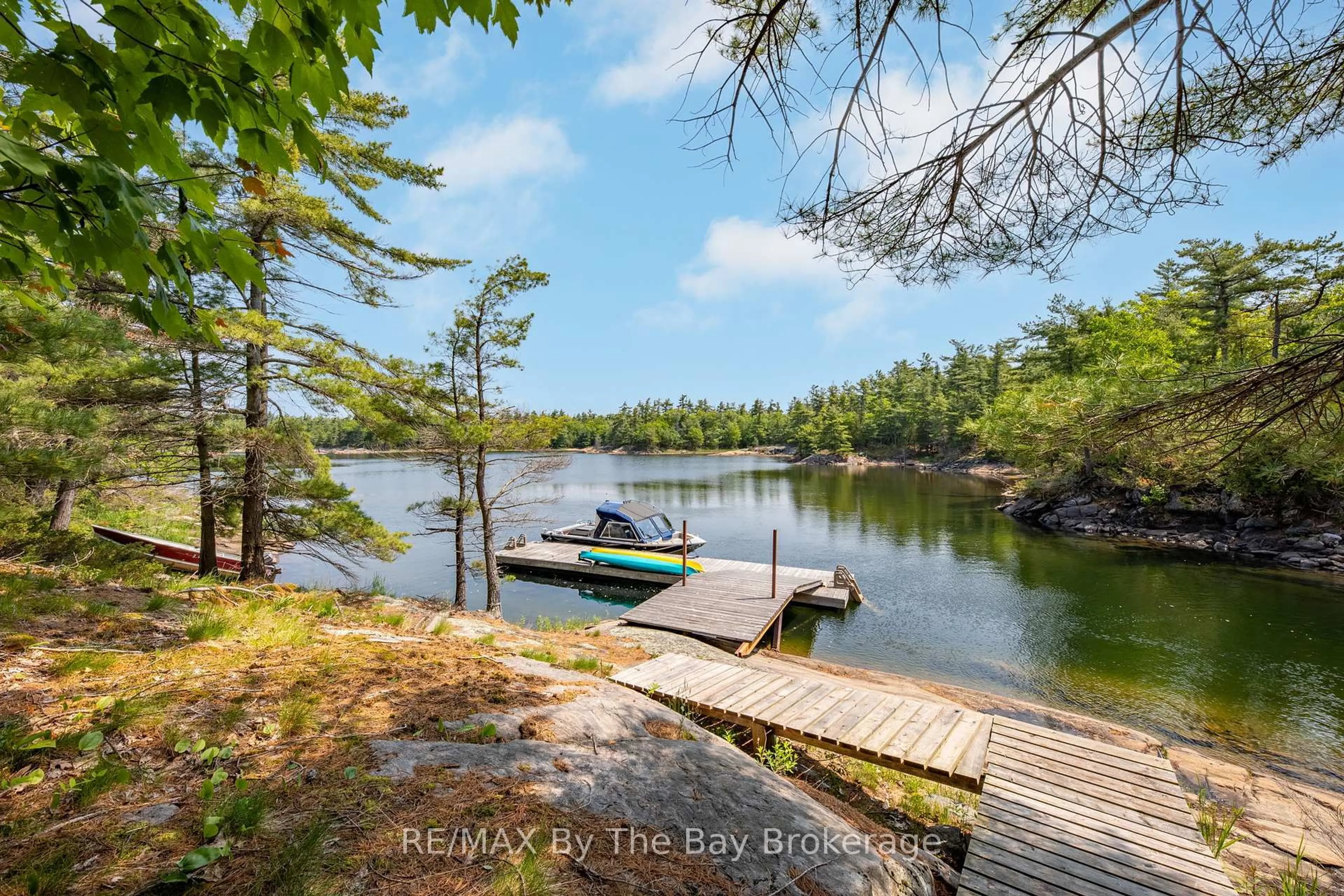 A pic from outside/outdoor area/front of a property/back of a property/a pic from drone, water/lake/river/ocean view for 12 Is 3900 Georgian Bay, Georgian Bay Ontario L0K 1S0