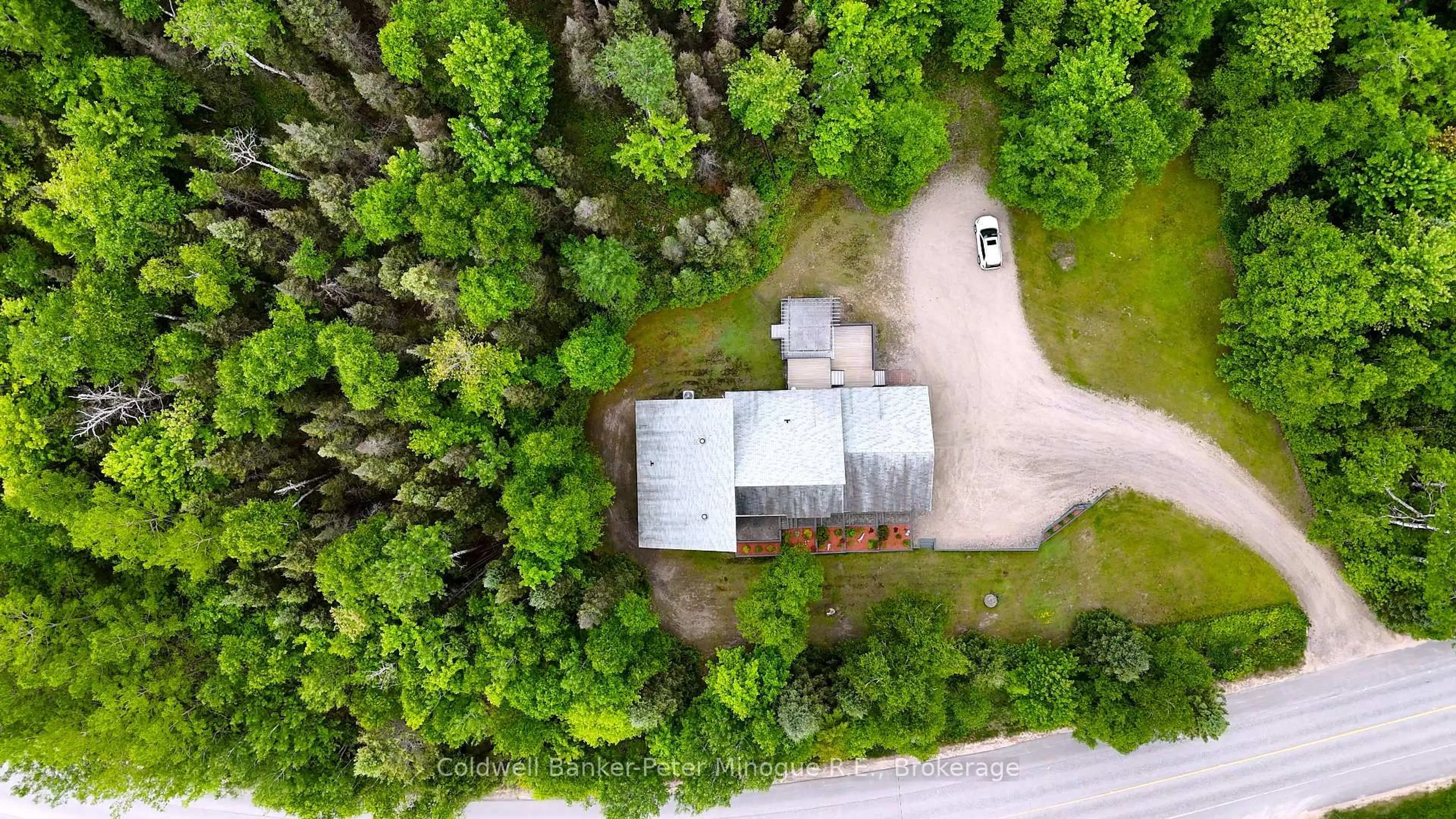 A pic from outside/outdoor area/front of a property/back of a property/a pic from drone, forest/trees view for 1224 Village Rd, East Ferris Ontario P0H 1B0