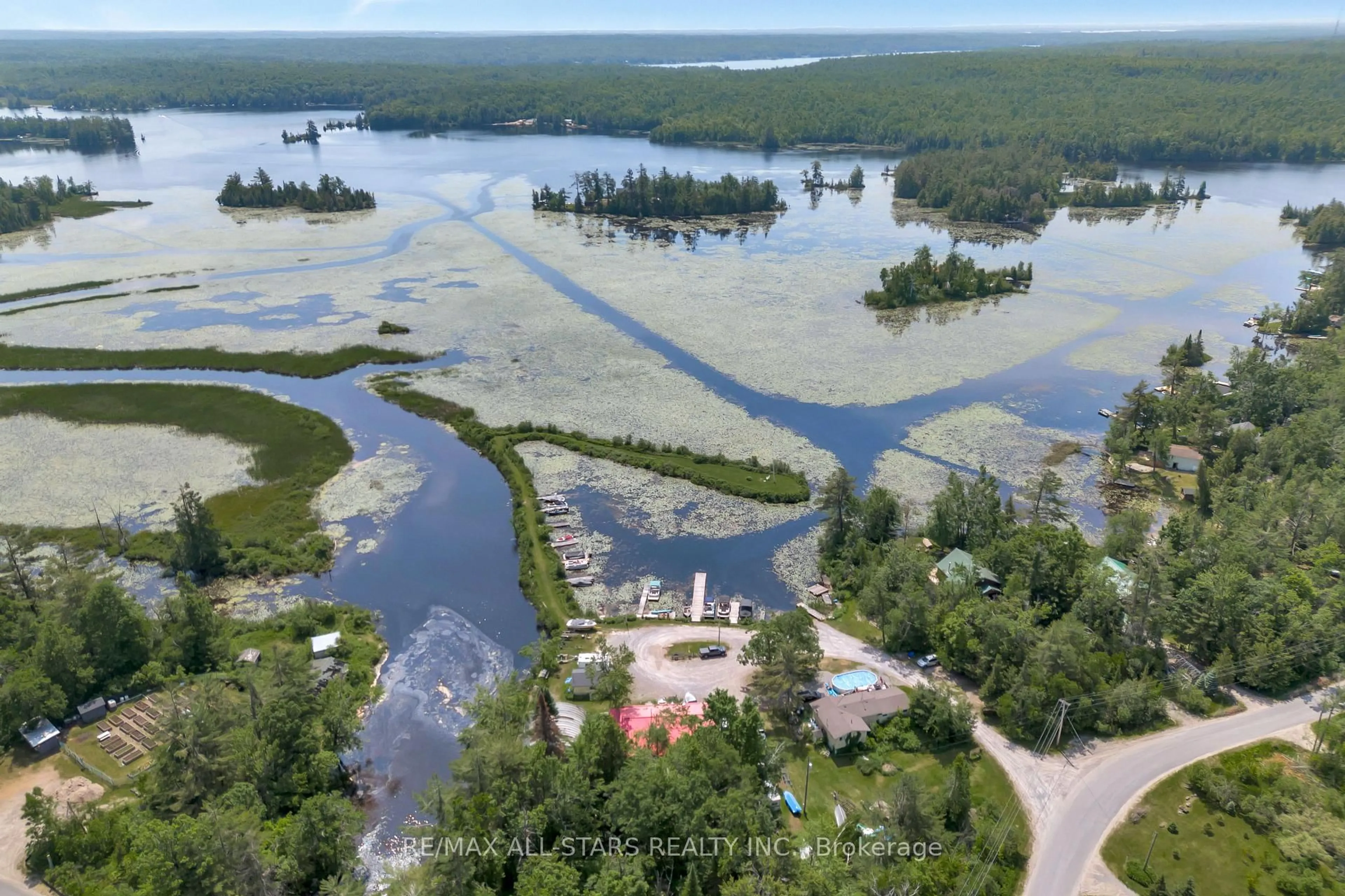 A pic from outside/outdoor area/front of a property/back of a property/a pic from drone, water/lake/river/ocean view for 394 Kennedy Dr, Trent Lakes Ontario K0M 1A0