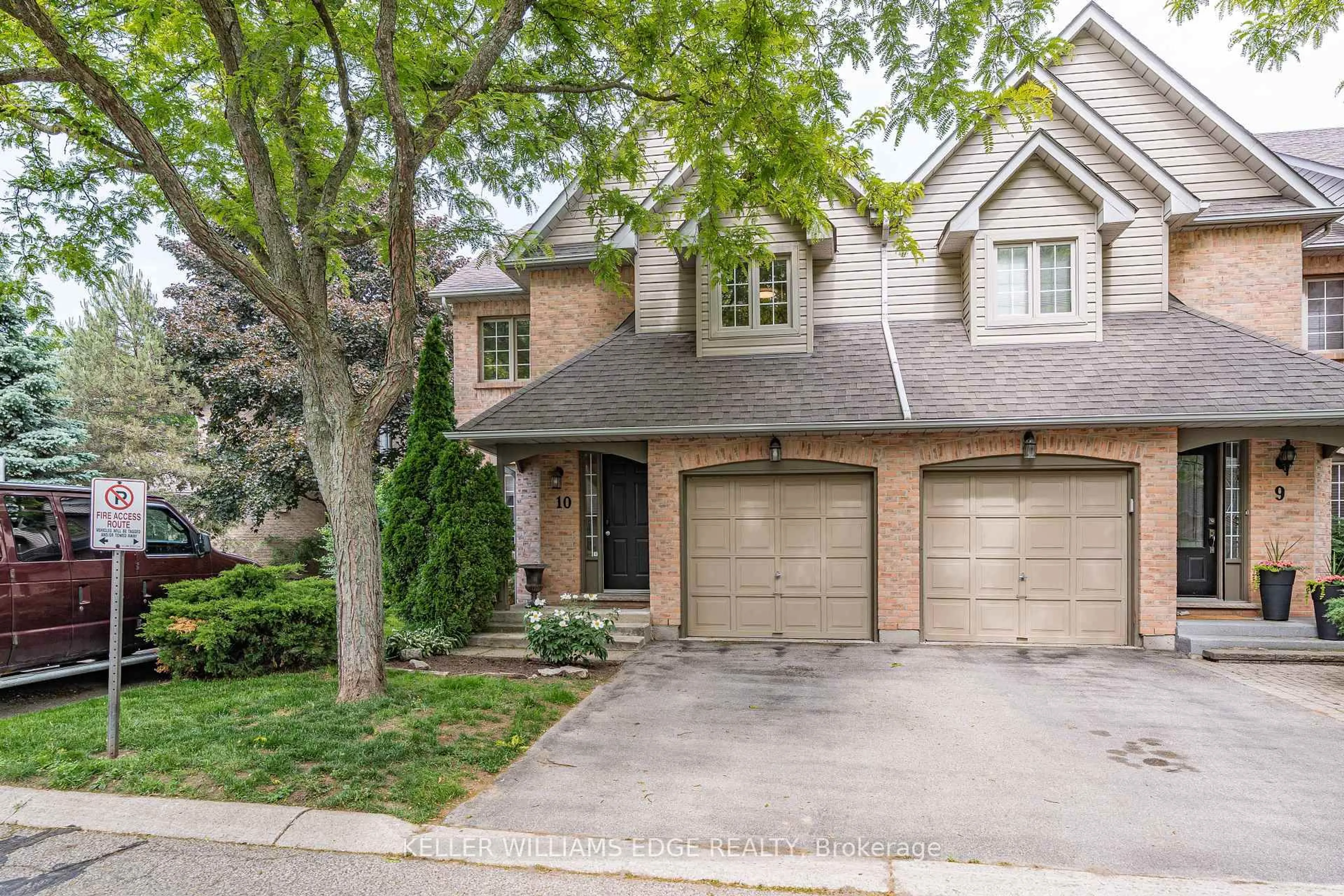 Home with brick exterior material, street for 320 Hamilton Dr #10, Hamilton Ontario L9G 4W6