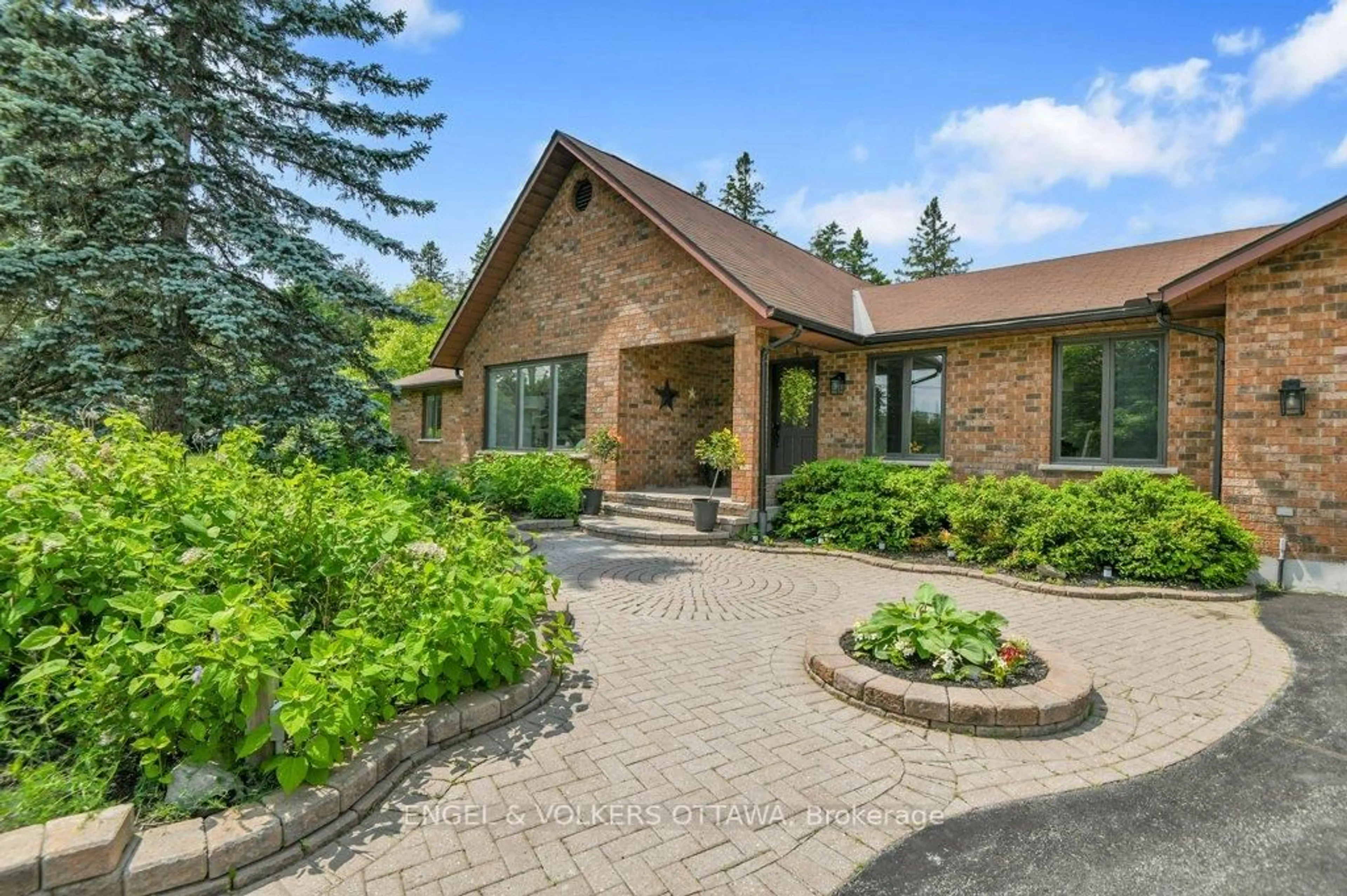 Home with brick exterior material, street for 102 Delaney Dr, Carp Ontario K0A 1L0
