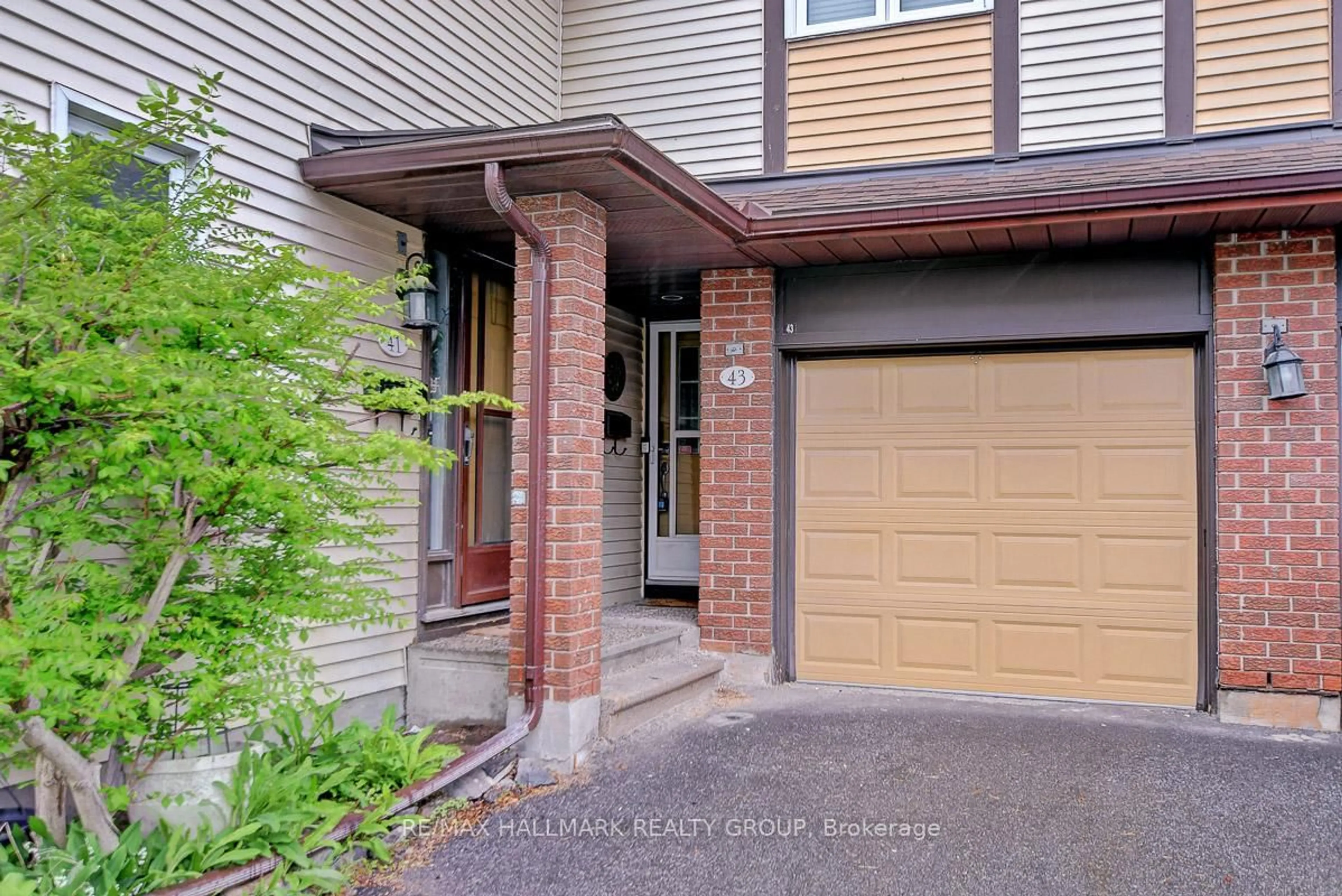 Home with brick exterior material, street for 43 Haxby Private #51, Ottawa Ontario K1T 3B7