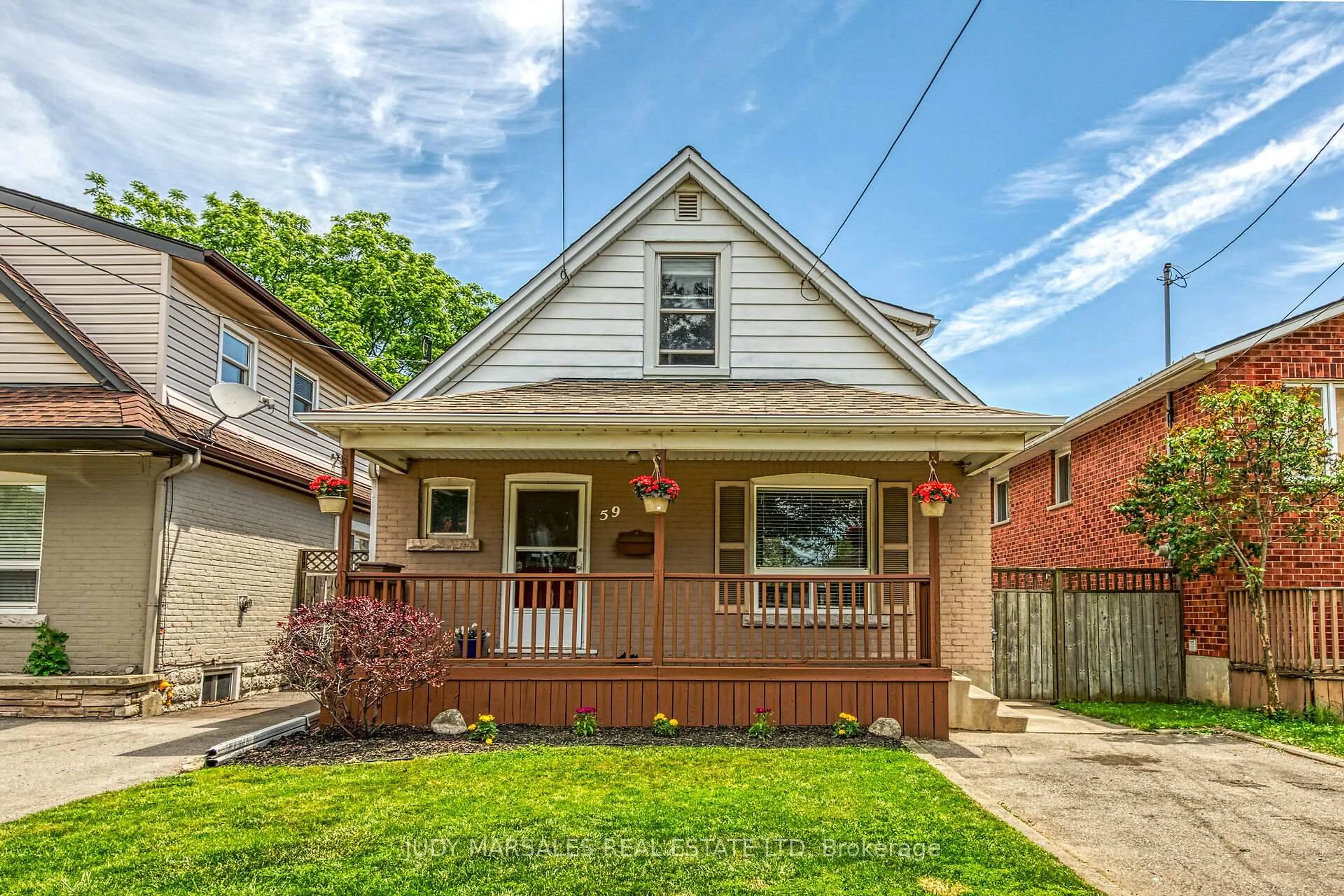 Home with brick exterior material, street for 59 East 26th St, Hamilton Ontario L8V 3C3